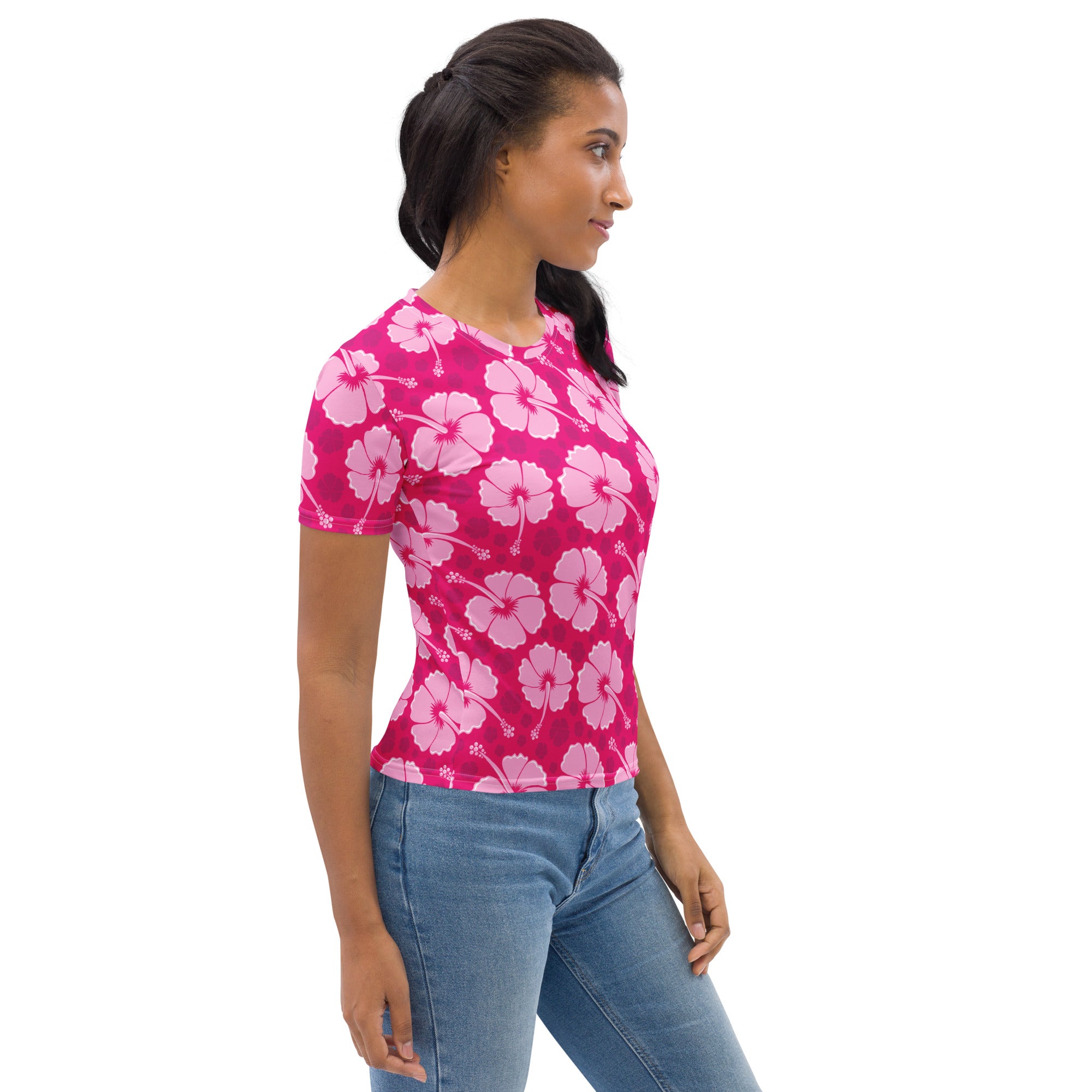 A vibrant pink women’s short-sleeved t-shirt with a light pink hibiscus floral pattern in soft stretch jersey