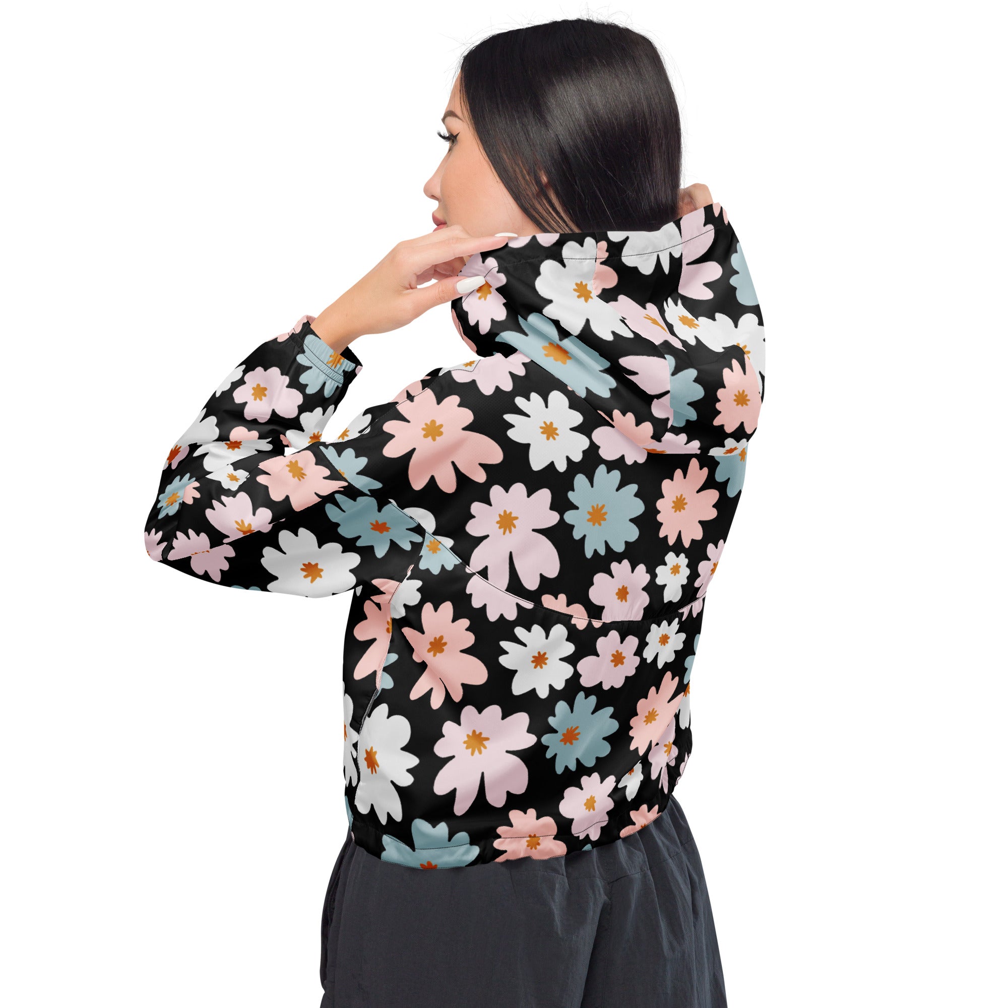 Women’s retro floral cropped black hooded windbreaker with vibrant pink white and light blue daisies lightweight and water resistant