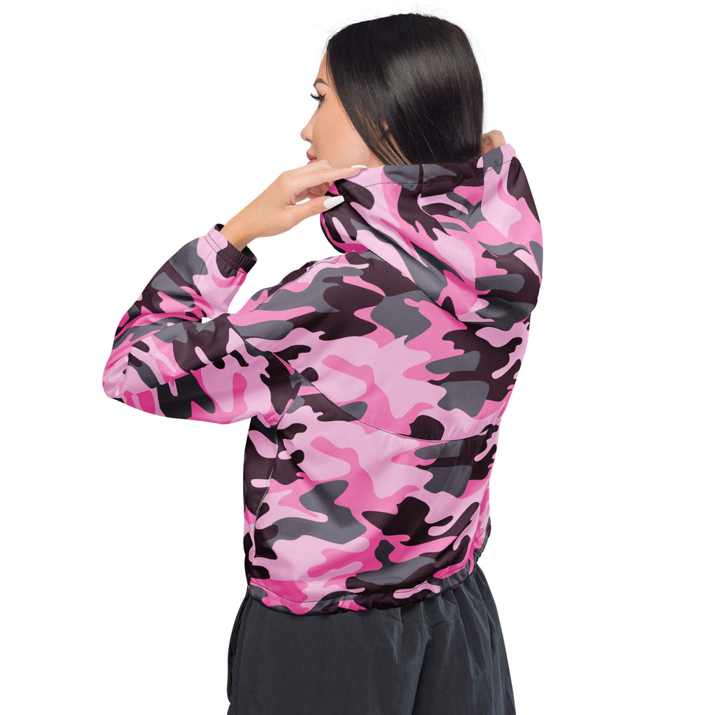 Women’s pink and black camouflage cropped windbreaker jacket with adjustable hood and pockets shown from the back