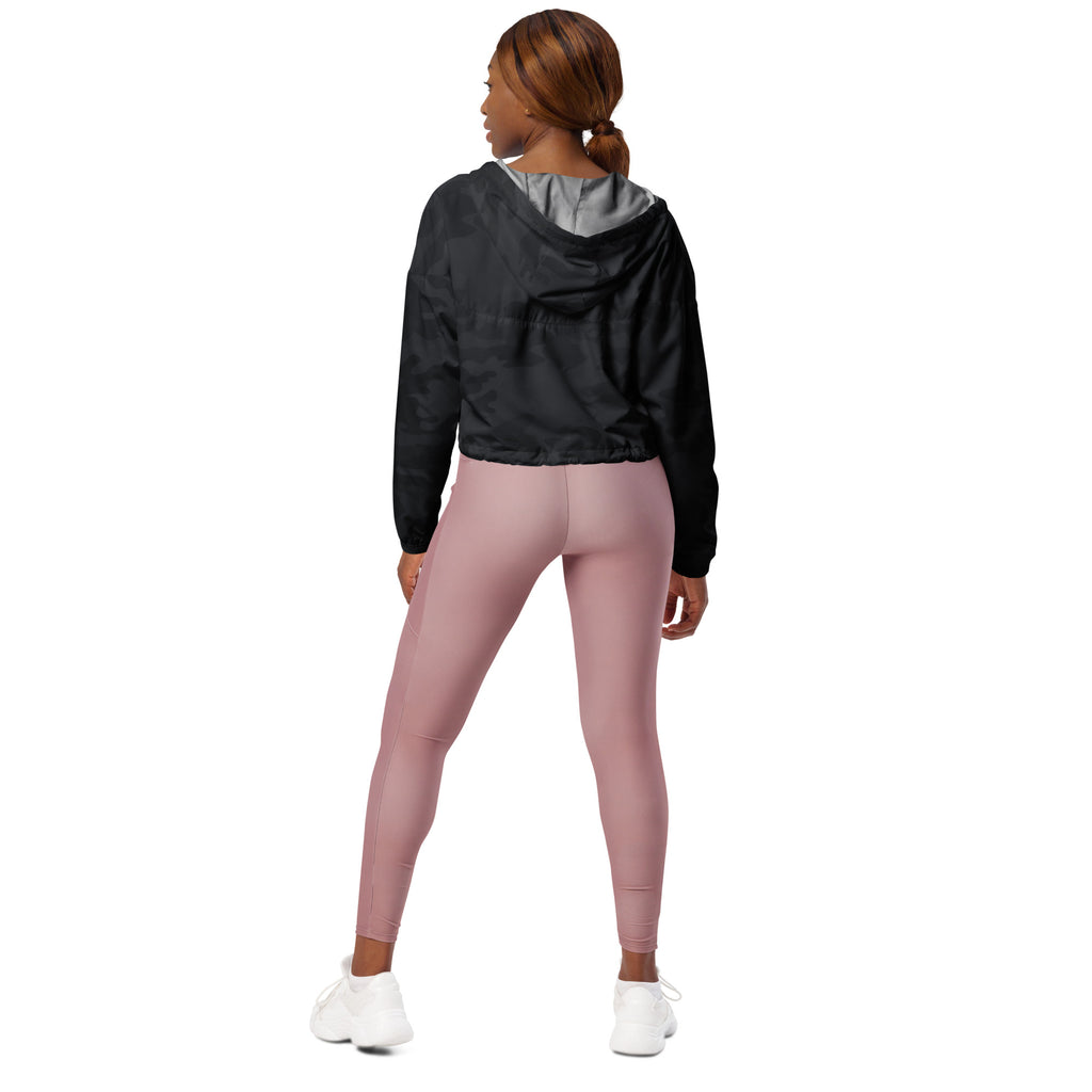 Women’s black camouflage cropped windbreaker with gray inner lining and adjustable hood shown with pink leggings
