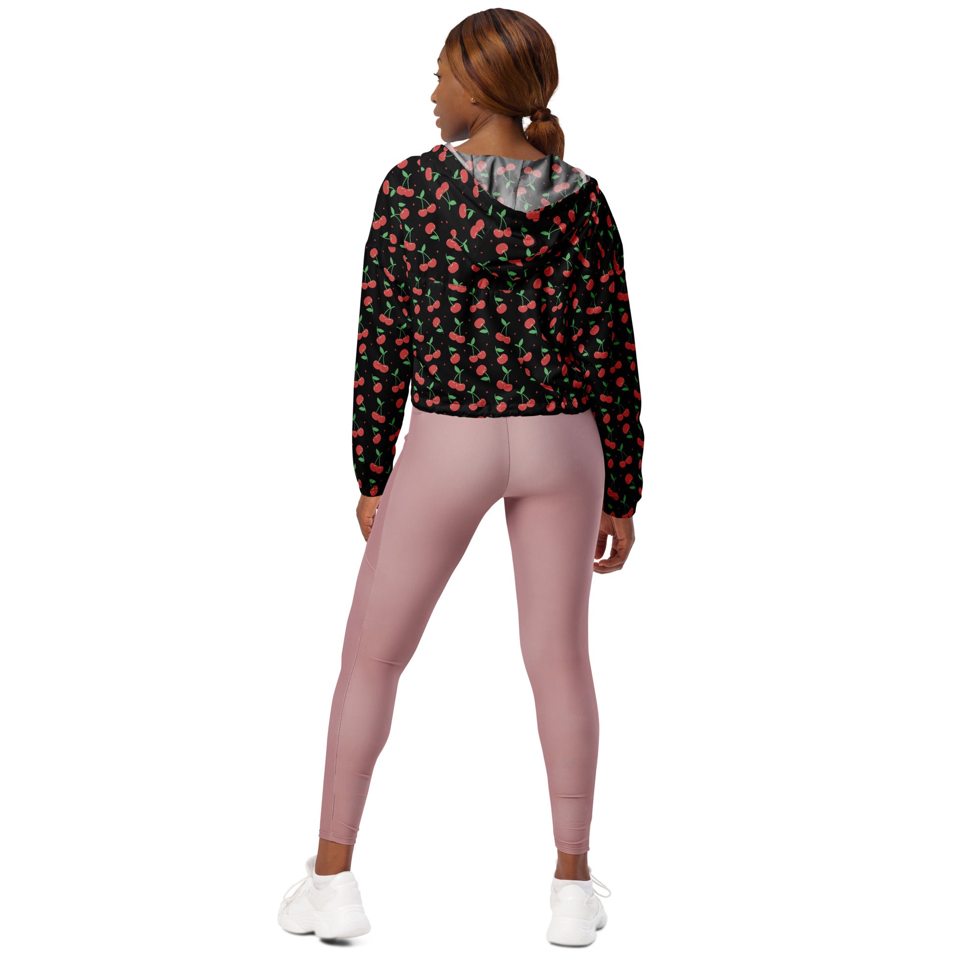 Women’s black cherry cropped windbreaker with a gray-lined hood and long sleeves lightweight and water resistant