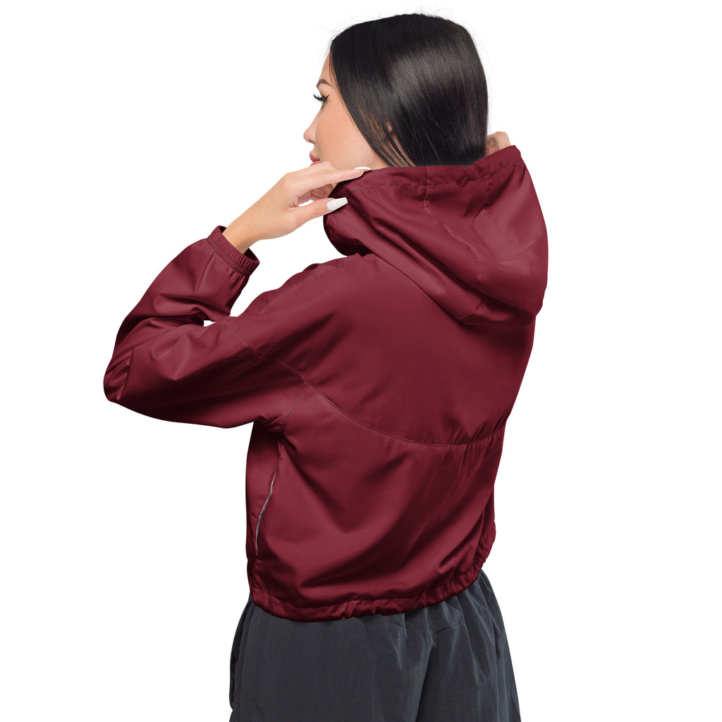 Women’s burgundy cropped windbreaker with smooth lightweight fabric elastic cuffs and adjustable hood and pockets