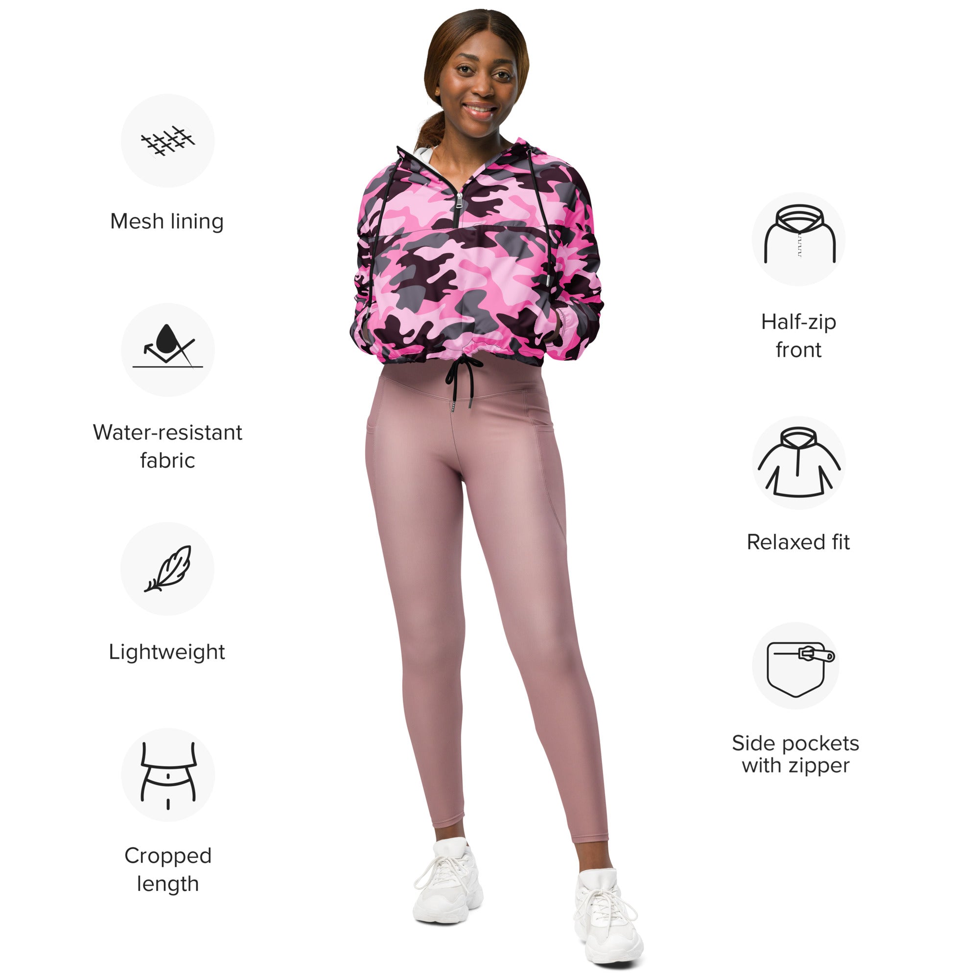 Women’s pink and black camouflage half-zip cropped windbreaker with mesh lining water-resistant fabric and zippered side pockets