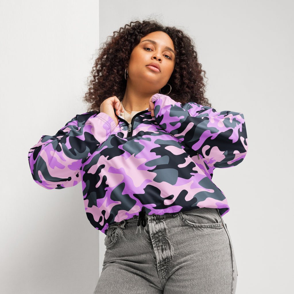 A vibrant purple and black camouflage cropped bomber jacket with half-zip front and adjustable hood for women
