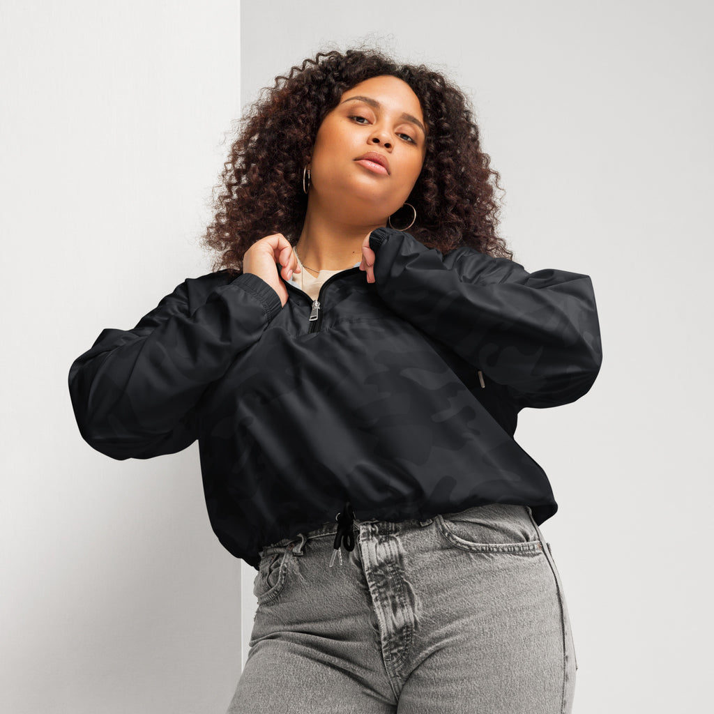 Women’s black nylon bomber jacket with half-zip front and drawstring waist lightweight and water resistant