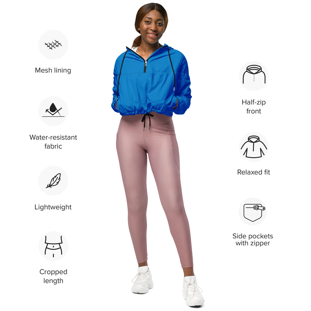 Women’s blue cropped windbreaker with half-zip, mesh lining, and lightweight water-resistant fabric