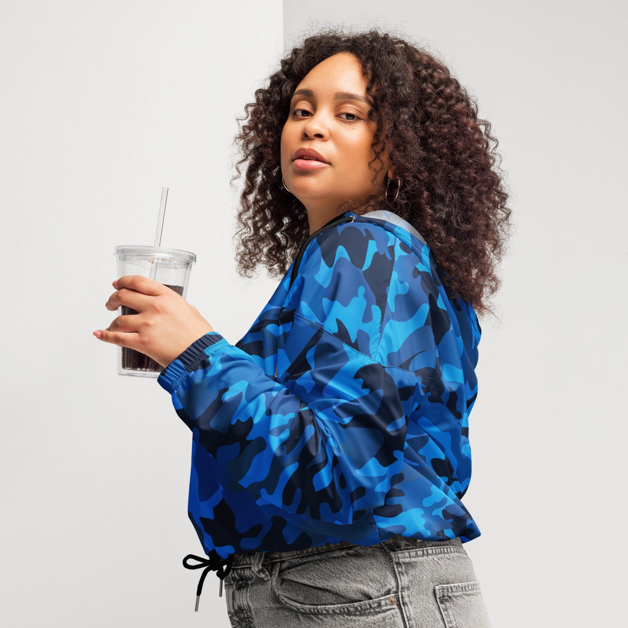 Women’s blue and black camouflage cropped bomber jacket with adjustable hood lightweight and water resistant