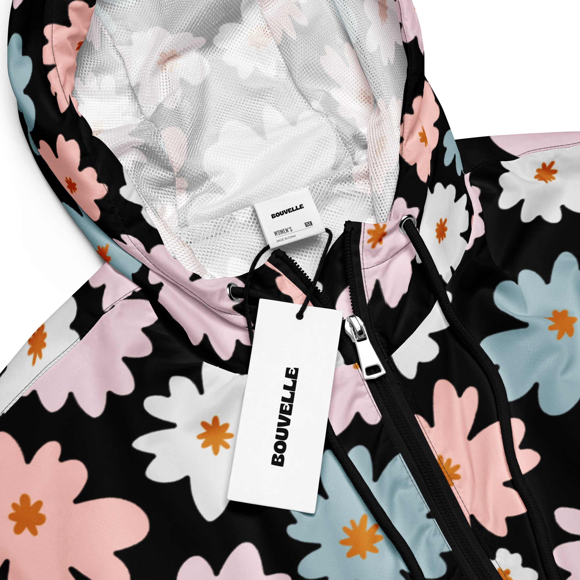 Women’s retro floral cropped windbreaker in black with pink white and light blue flowers with orange centers