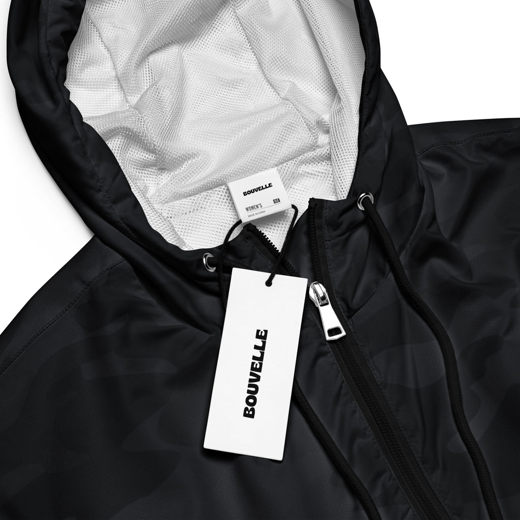 Women’s black camouflage cropped windbreaker with white mesh lining silver zipper adjustable hood and pockets