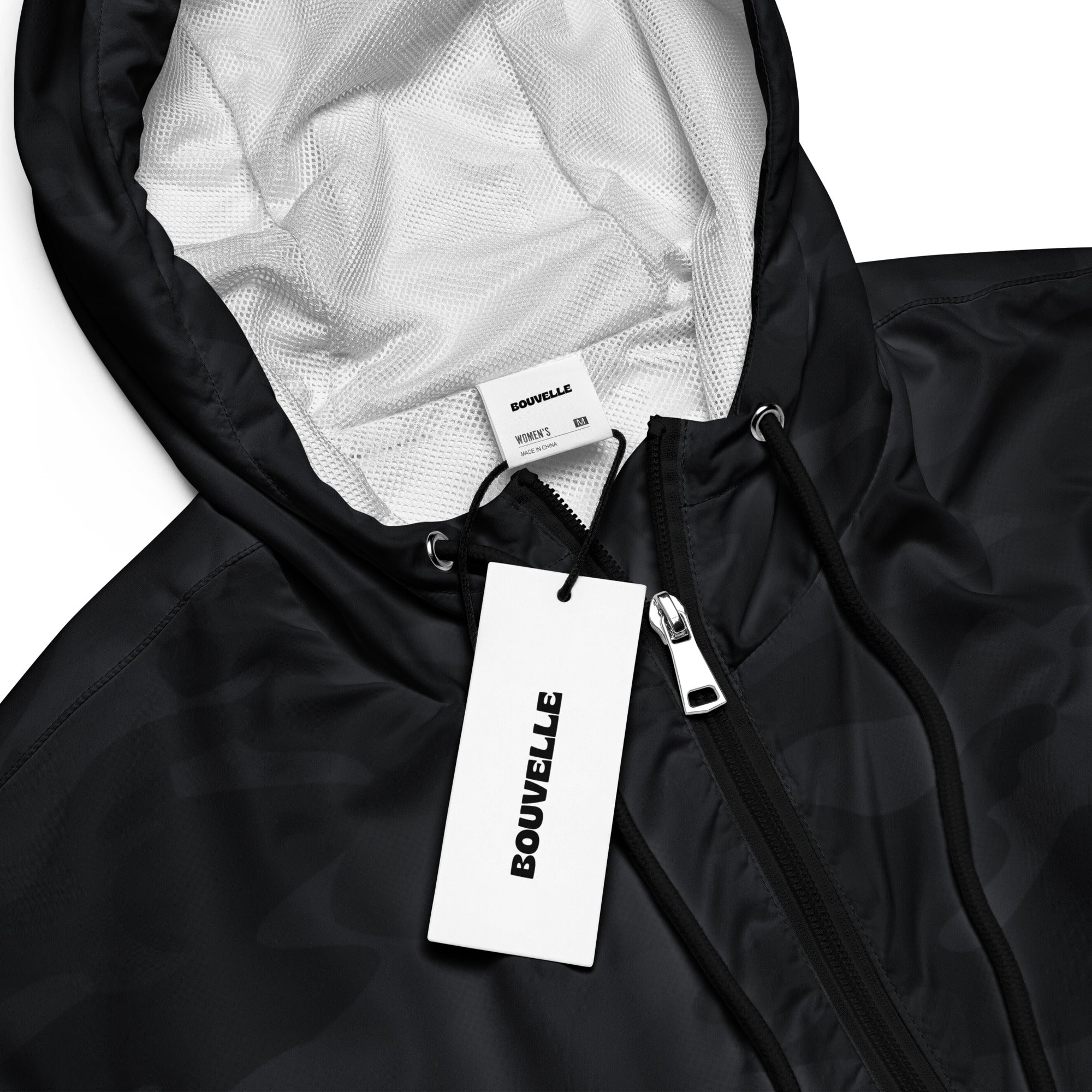 Women’s black camouflage cropped windbreaker with white mesh lining silver zipper adjustable hood and pockets