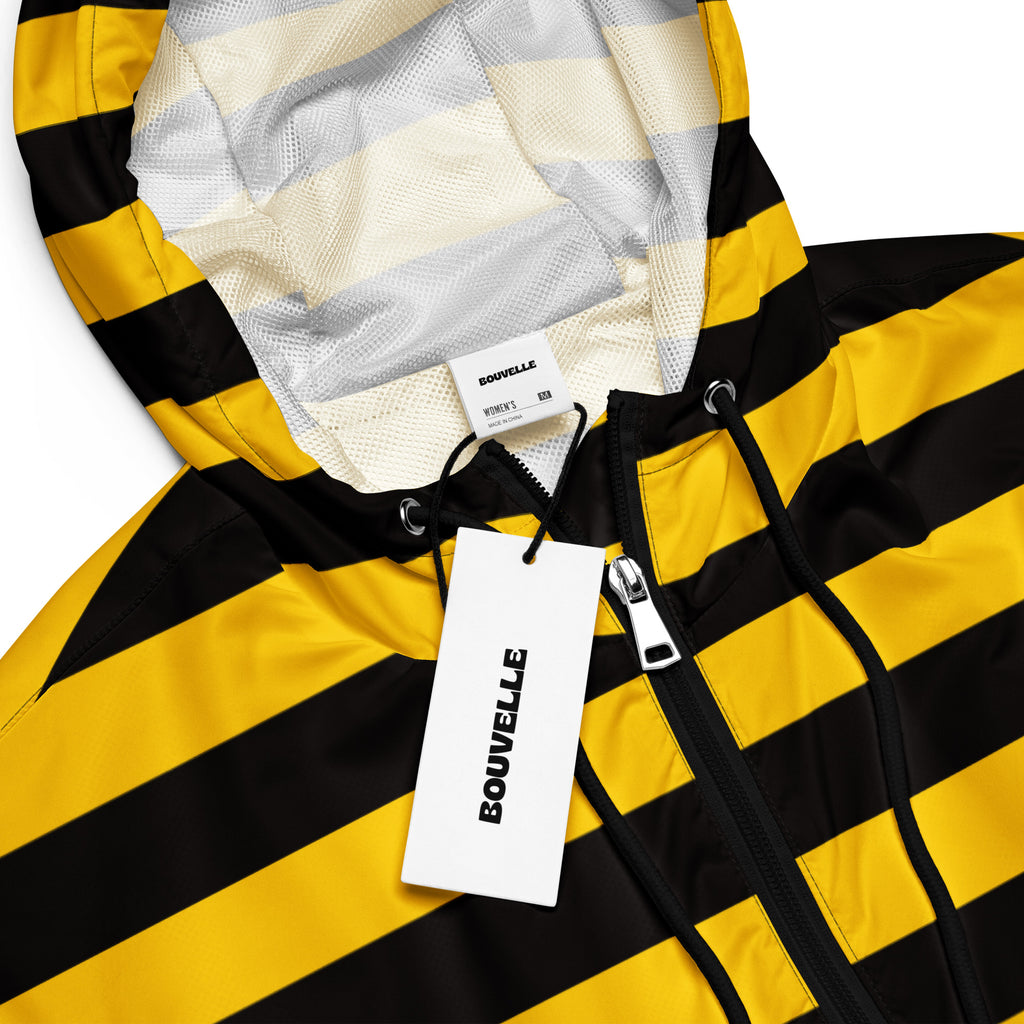 Women’s bouvelle bumblebee stripe cropped windbreaker in black and yellow with mesh lining and adjustable hood