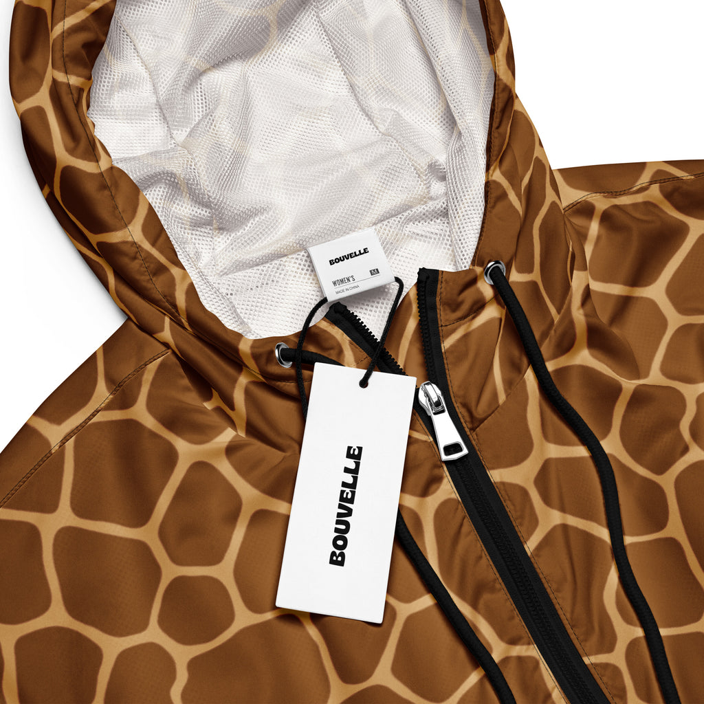 Women’s giraffe print cropped windbreaker jacket by bouvelle with brown tan shell and black zipper accents