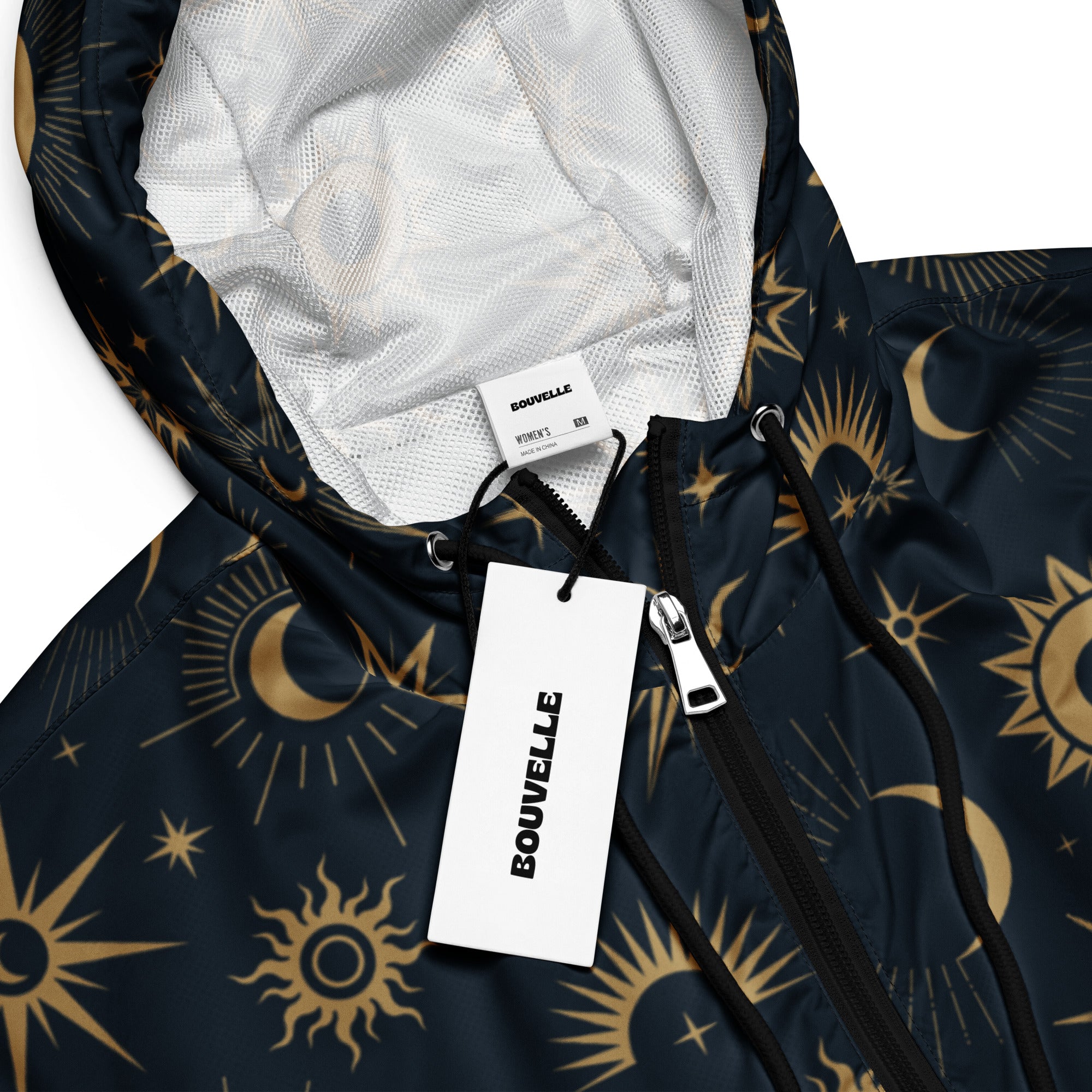 Dark blue women’s cropped hooded windbreaker with gold sun moon star celestial pattern lightweight and water resistant