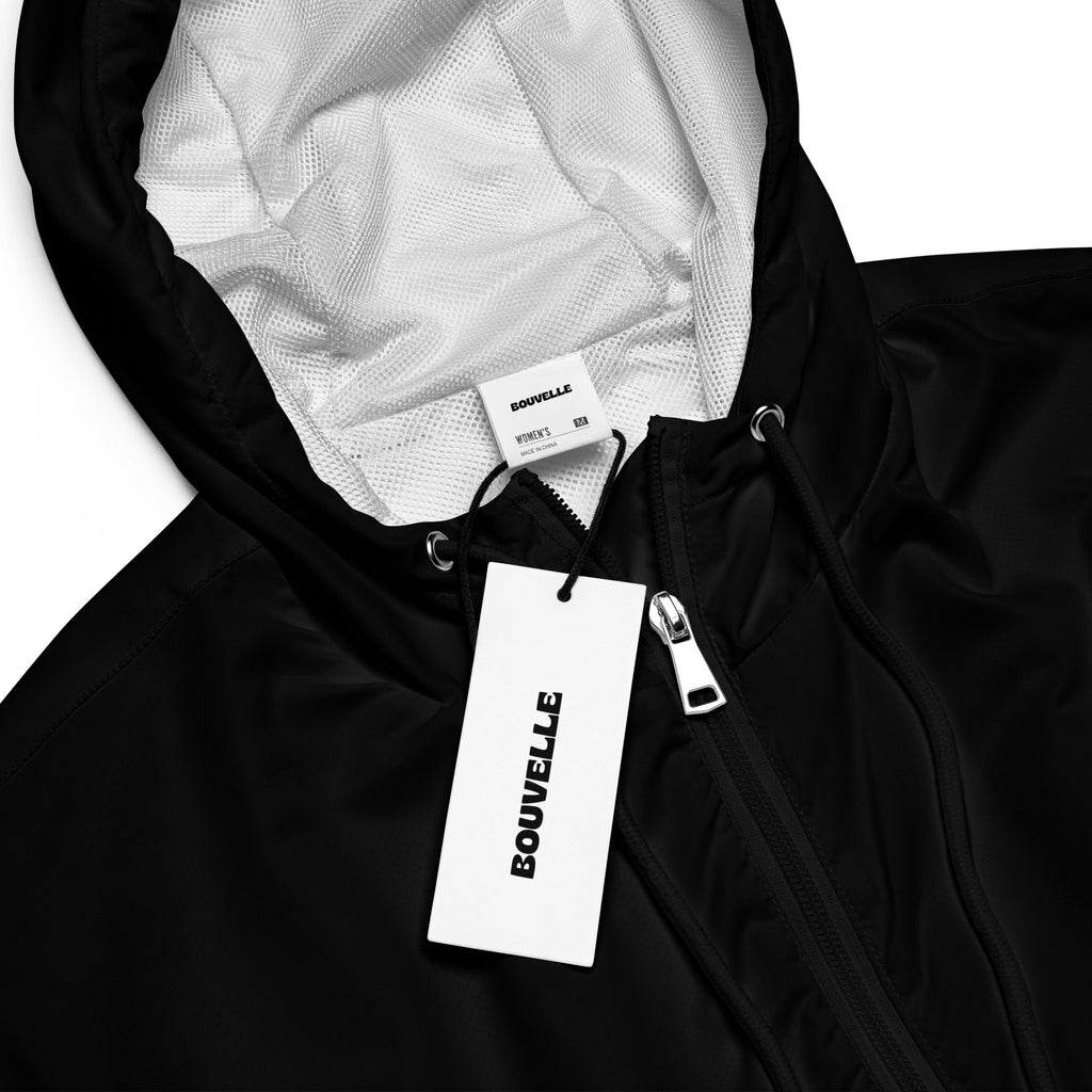 Women’s black cropped bouvelle windbreaker jacket with white mesh lining silver zipper and adjustable hood and pockets