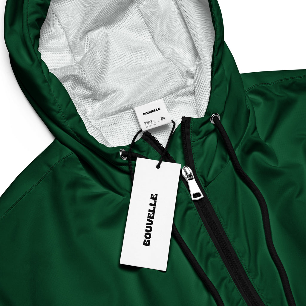 Women’s dark green bouvelle hooded cropped windbreaker with black zipper and mesh lining, lightweight and water resistant