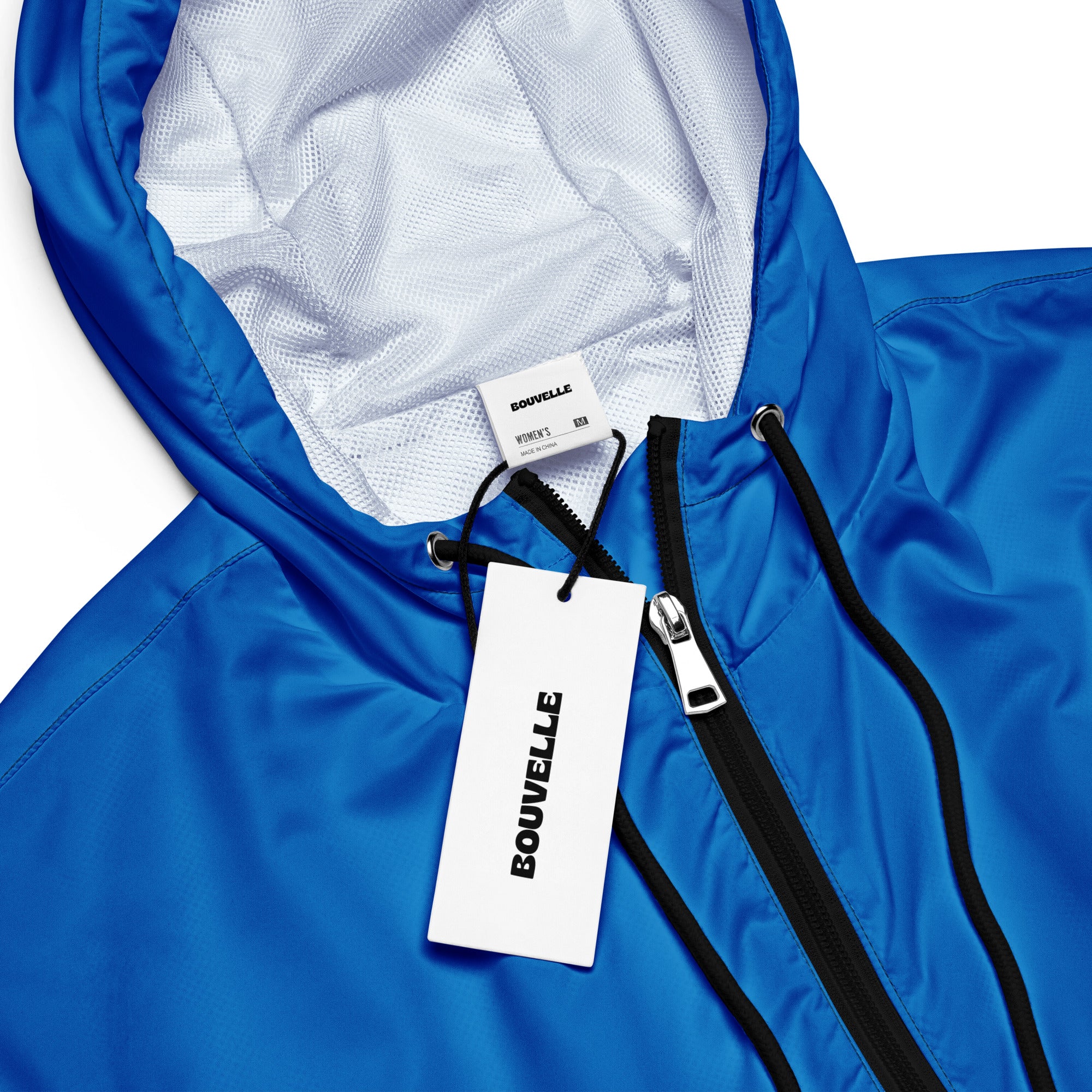 Women’s bright blue cropped windbreaker with white mesh lining black zipper trim lightweight hooded jacket with pockets
