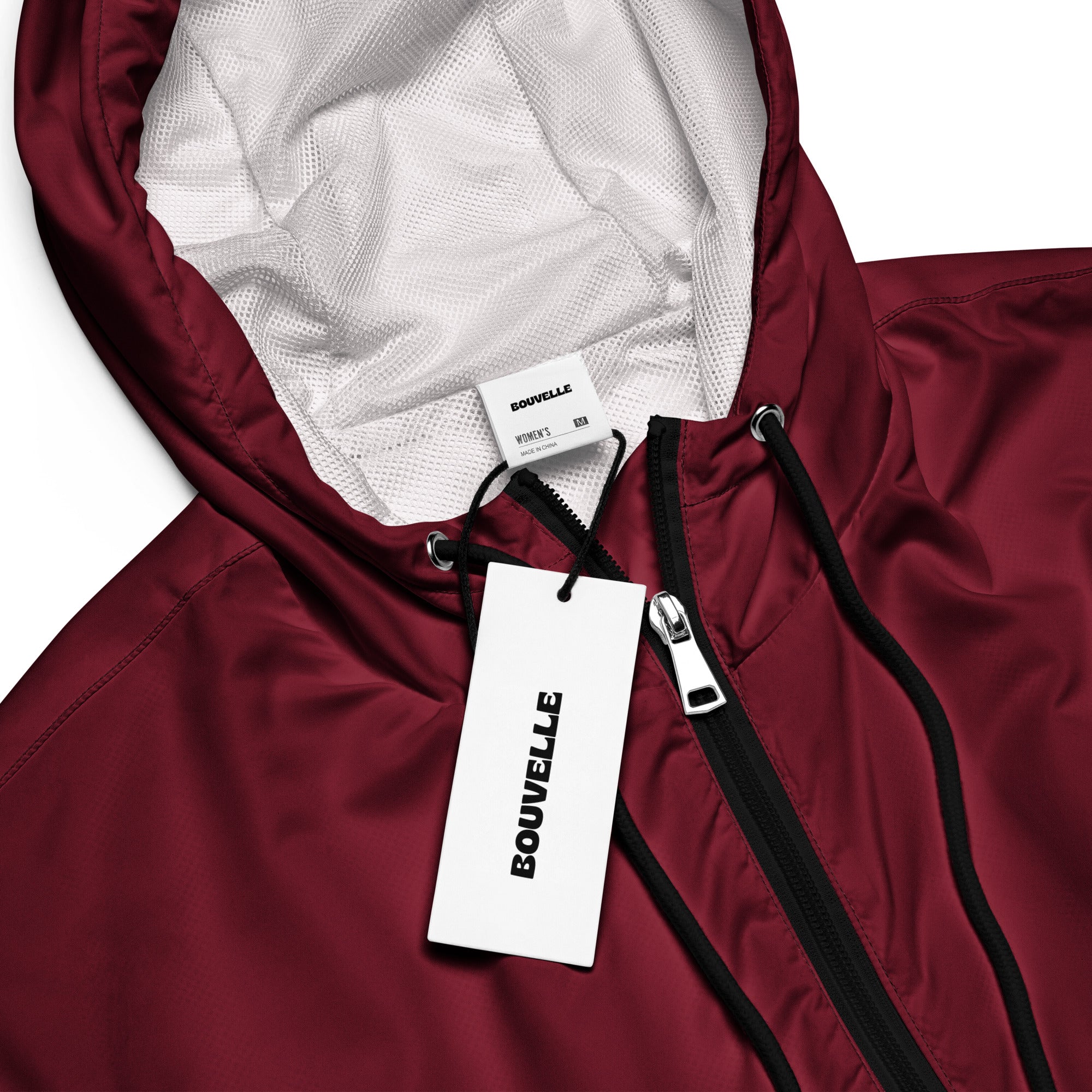 Women’s burgundy cropped windbreaker with lightweight water resistant fabric black zipper and white mesh lining