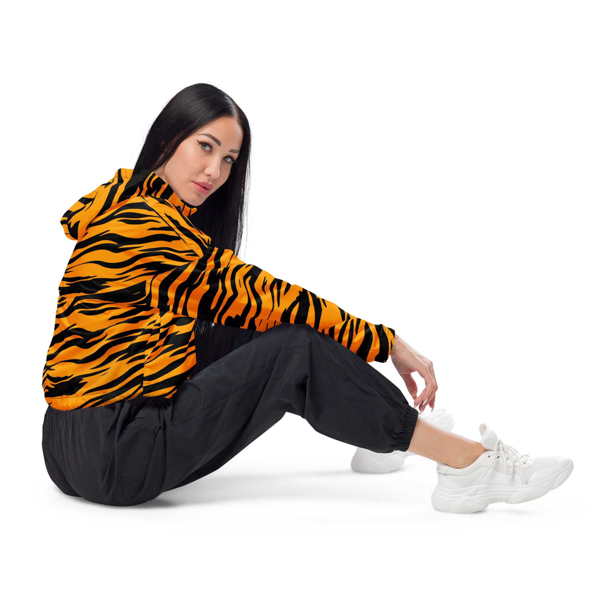 Women’s lightweight water resistant cropped windbreaker in orange and black tiger stripe with adjustable hood and pockets