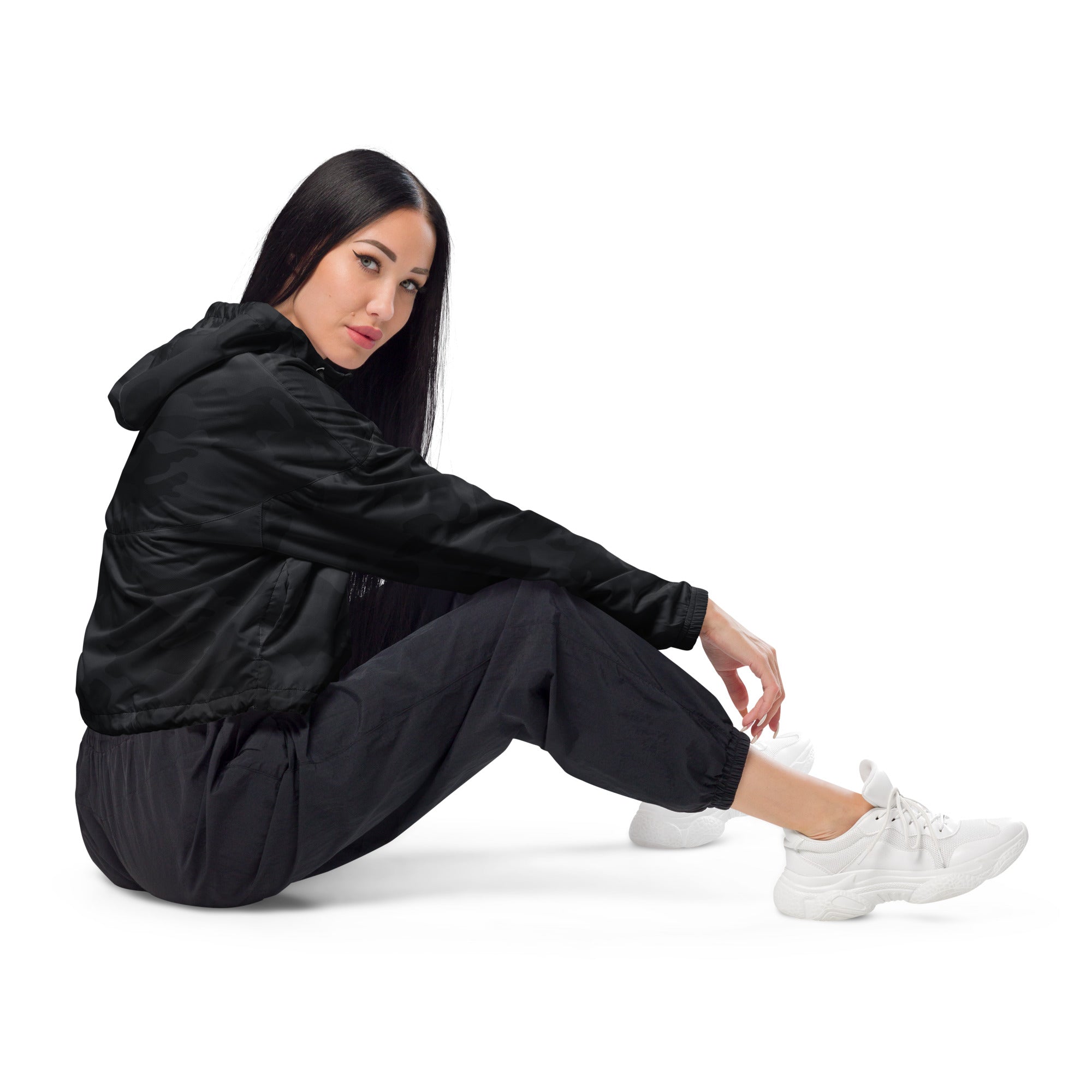 Women’s black camouflage cropped windbreaker with sleek lightweight fabric and adjustable hood shown from the back
