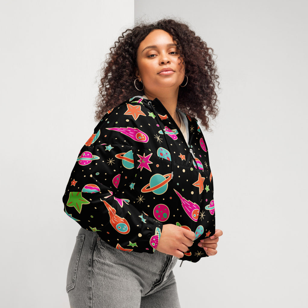 Black bomber jacket with vibrant space-themed print featuring colorful planets stars and rockets in pink teal orange and green