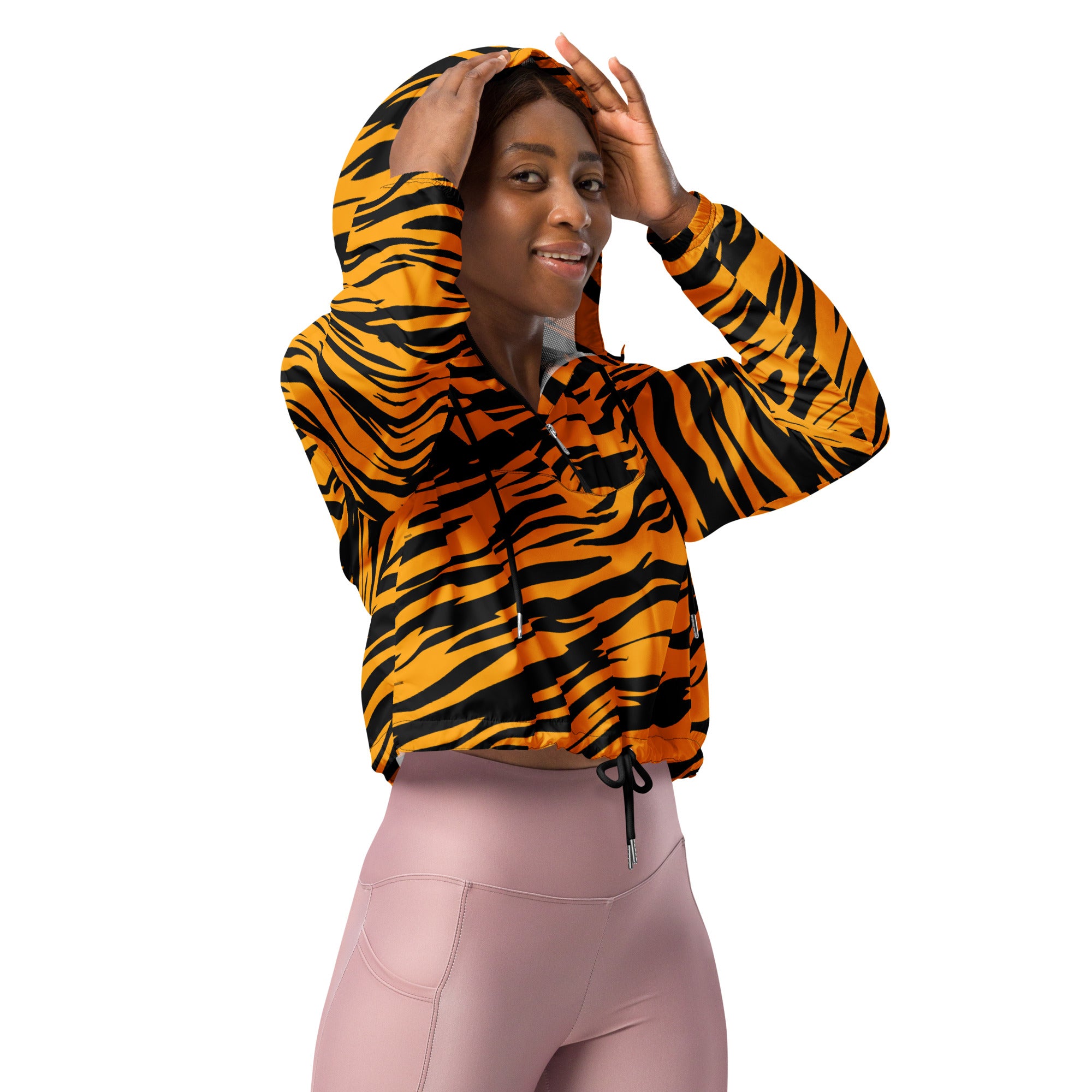 Women’s tiger stripe cropped windbreaker in vibrant orange and black with adjustable hood and drawstring waistband