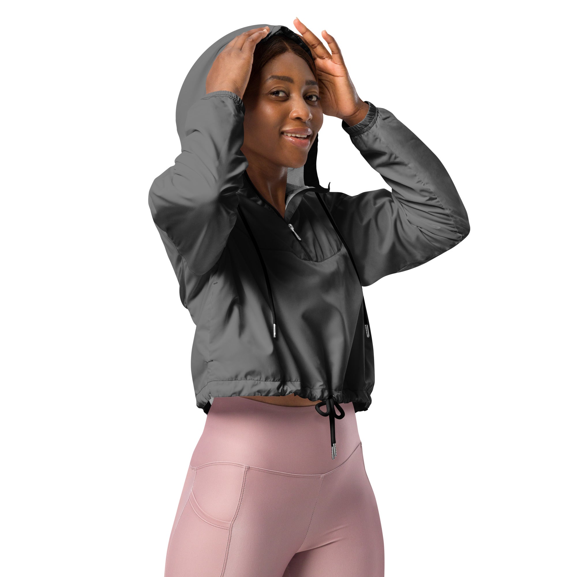 Women’s gray cropped windbreaker with shiny nylon finish adjustable hood black drawstrings lightweight and water resistant