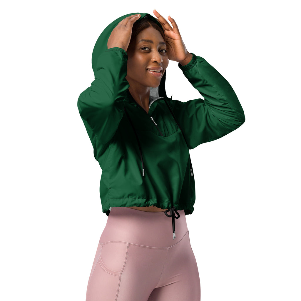 A vibrant dark green cropped nylon windbreaker jacket with adjustable hood black drawstrings and pockets for women