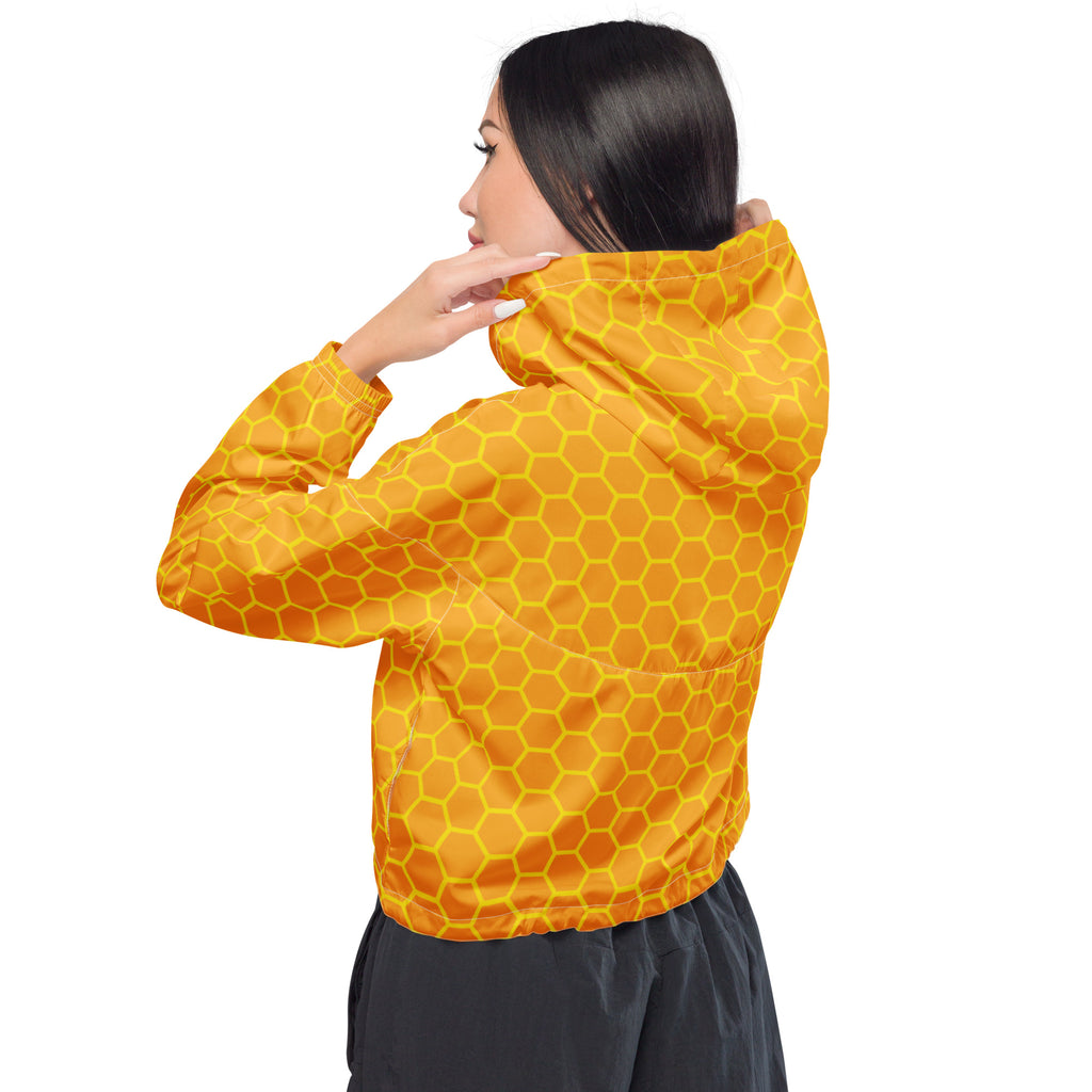 A vibrant yellow honeycomb-patterned lightweight cropped windbreaker jacket with adjustable hood and pockets for women