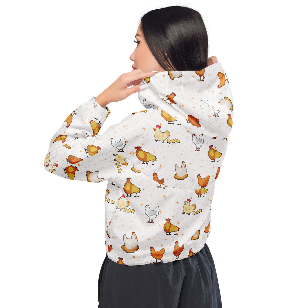 Women’s white hooded cropped windbreaker with playful cartoon chicken pattern in yellow brown and white colors