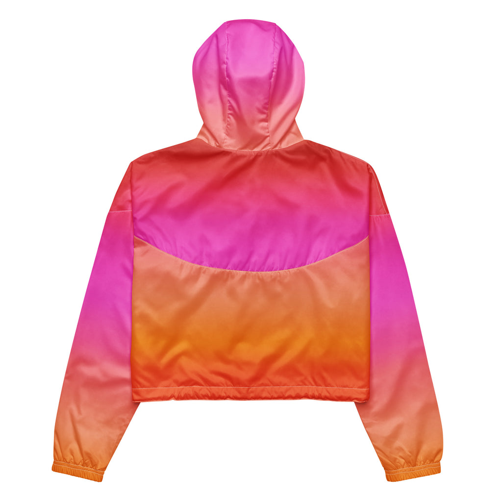 Women’s sunset ombre cropped windbreaker in vibrant pink orange and magenta nylon with adjustable hood and pockets