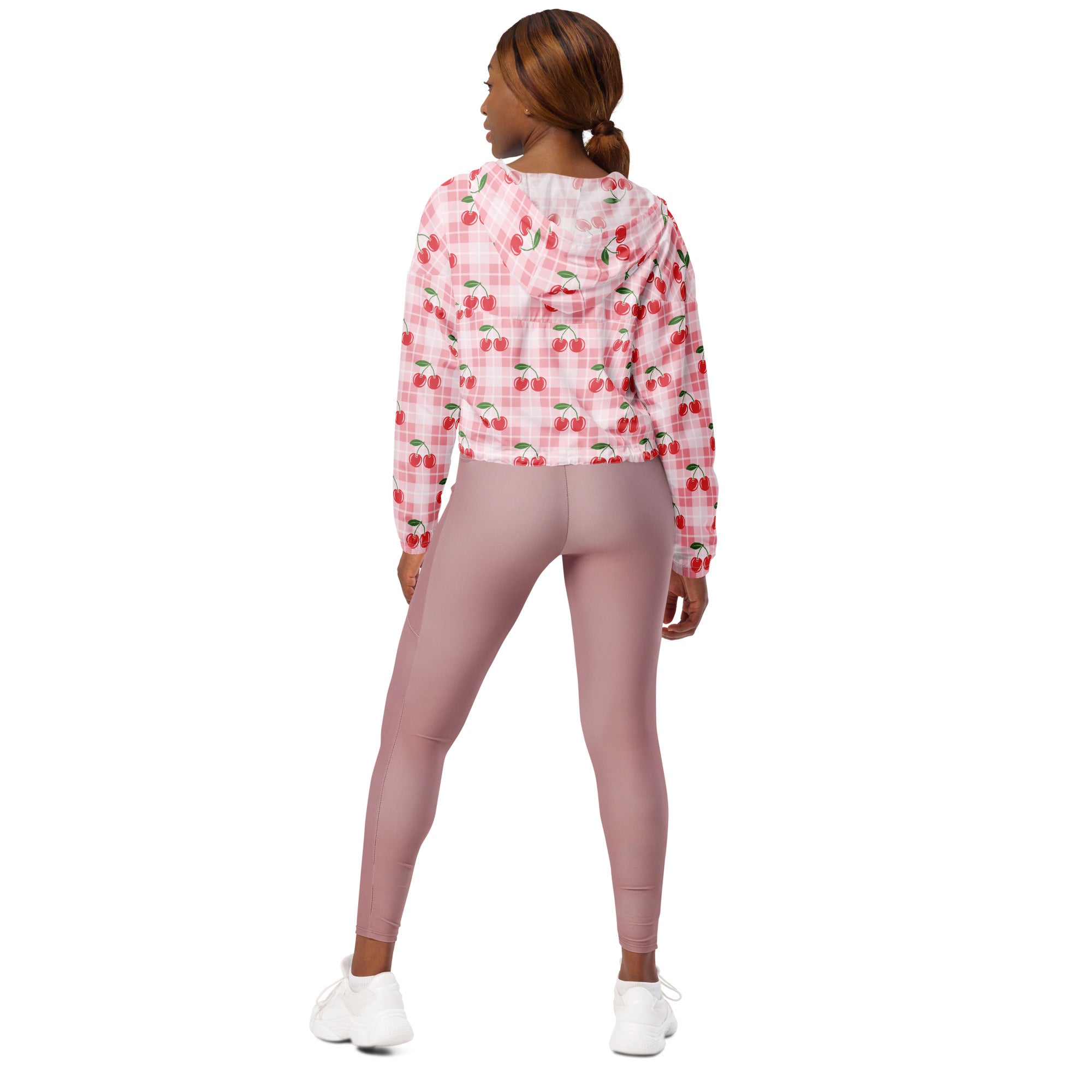 Women’s pink cherry plaid cropped windbreaker with adjustable hood and pockets in lightweight water resistant fabric