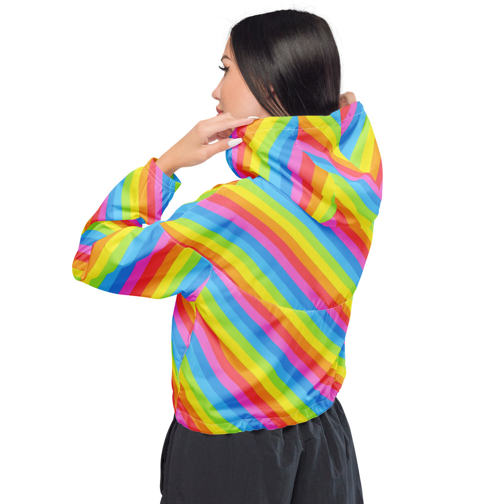 Women’s lightweight water resistant cropped windbreaker with vibrant diagonal rainbow stripes and adjustable hood