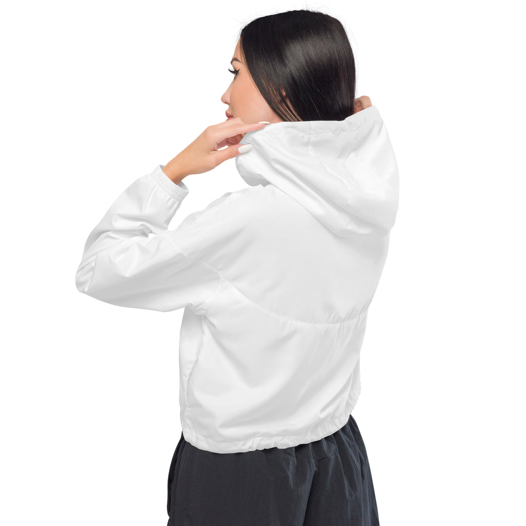 White cropped windbreaker with adjustable hood and pockets in sleek lightweight fabric for women
