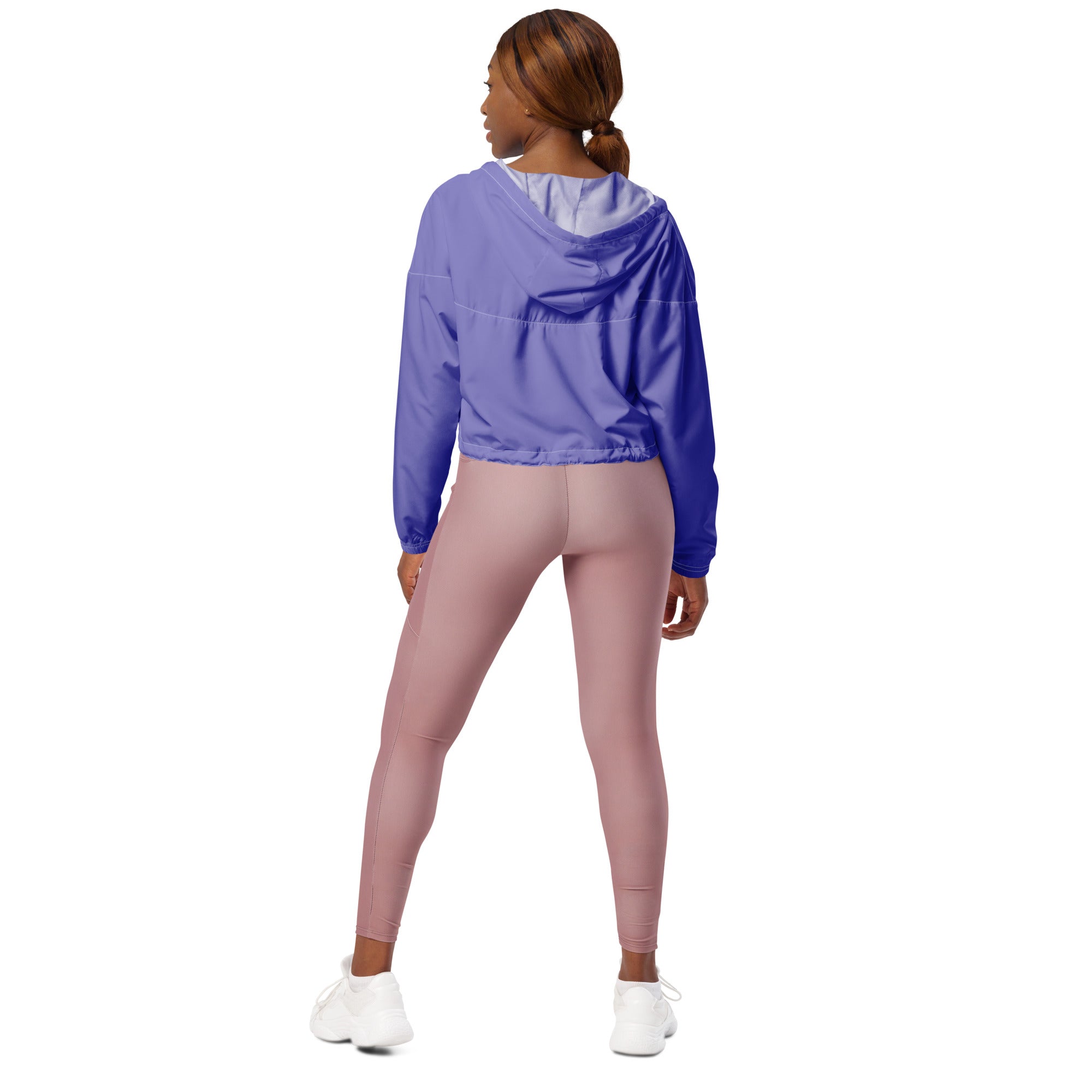 Women’s purple cropped windbreaker with vibrant hood, light blue lining, elastic cuffs, and adjustable hood pockets