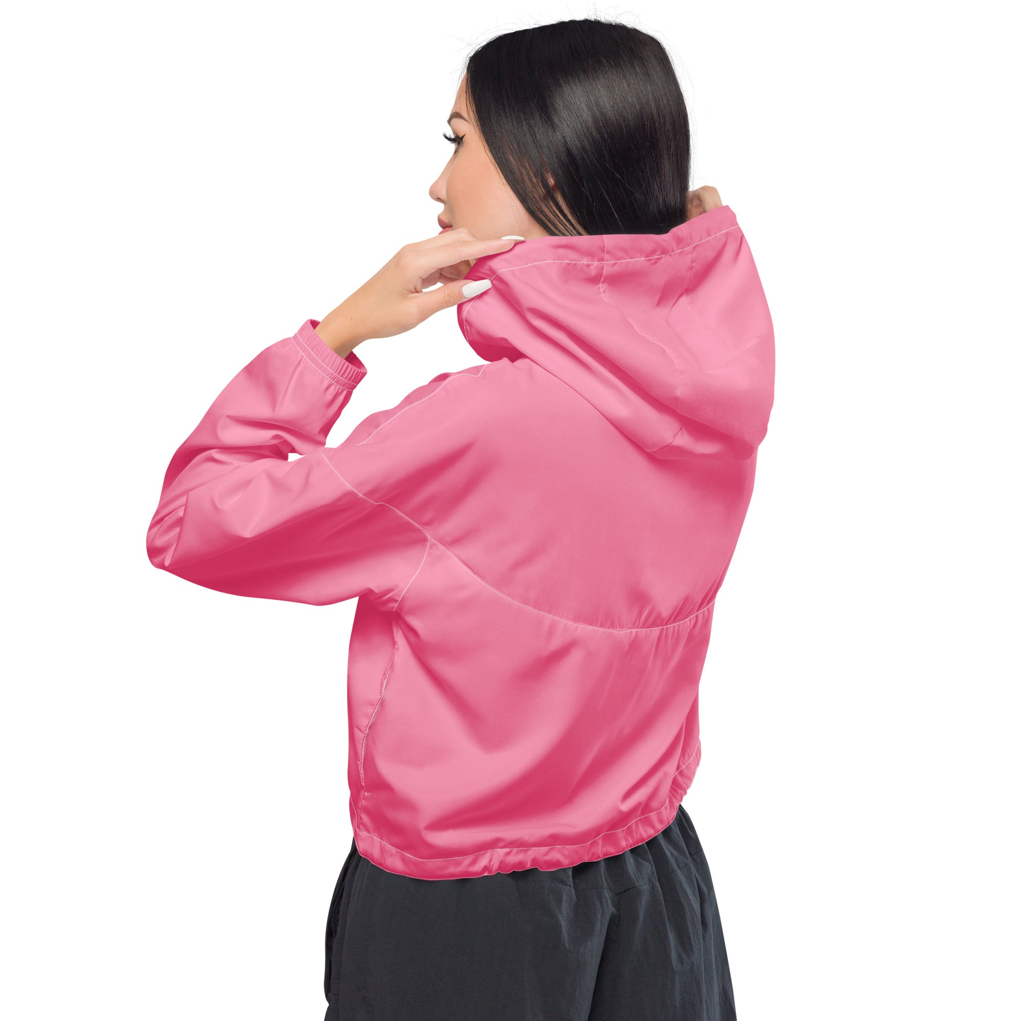 Vibrant pink women’s cropped windbreaker jacket with sleek lightweight fabric elasticated cuffs and adjustable hood