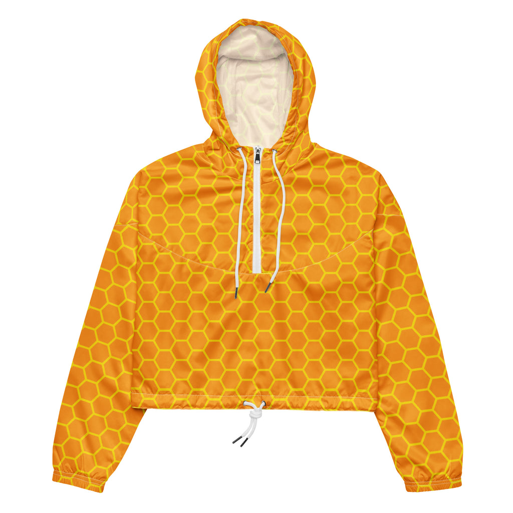A vibrant yellow honeycomb patterned women’s cropped windbreaker with white lining, adjustable hood, and matching drawstrings