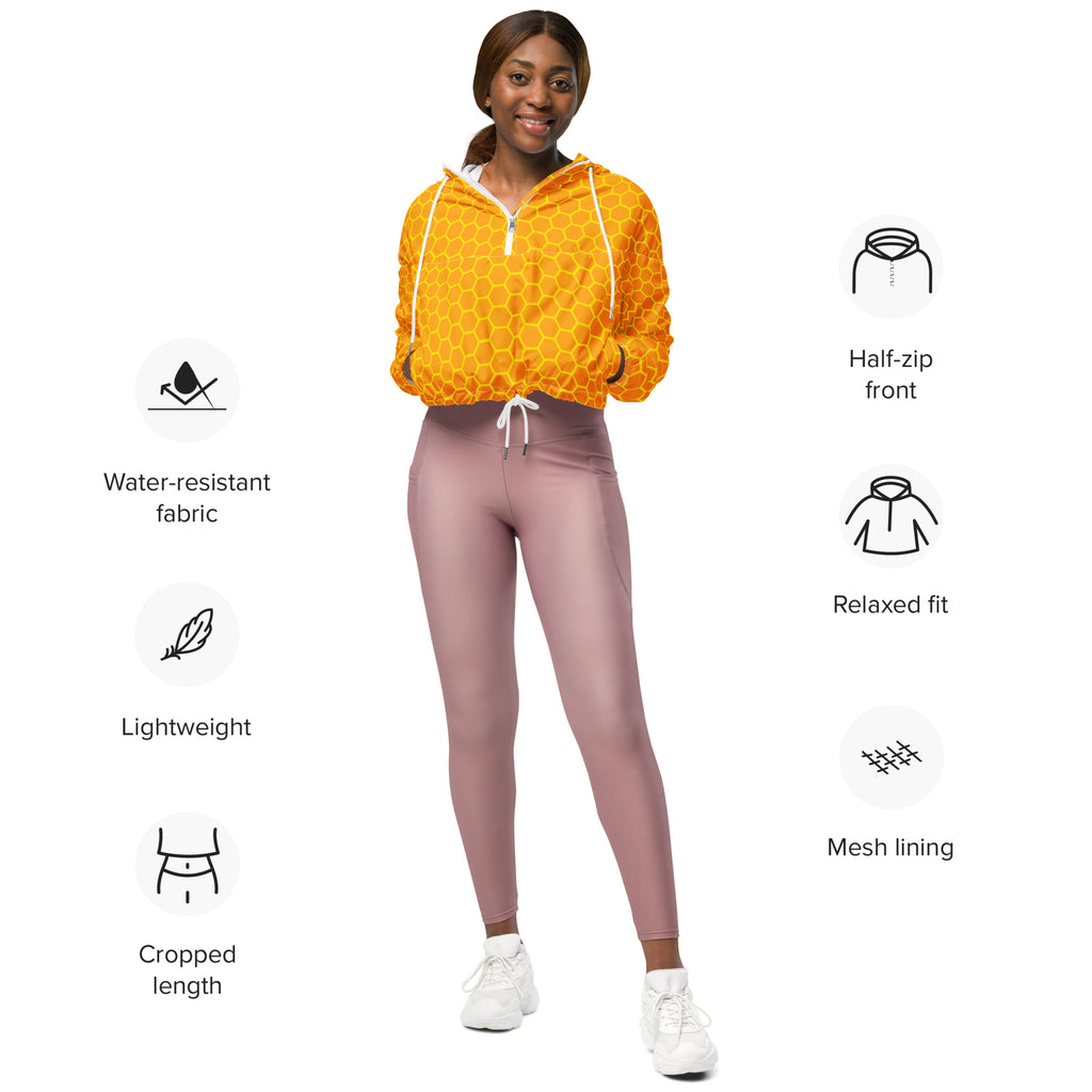 Vibrant yellow honeycomb-patterned cropped windbreaker hoodie with white drawstrings and half-zip front for women