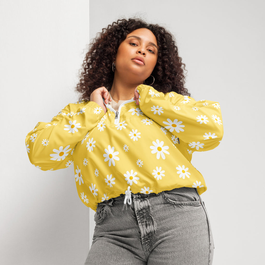 Women’s yellow daisy cropped windbreaker showing back side with lightweight water resistant fabric and adjustable hood