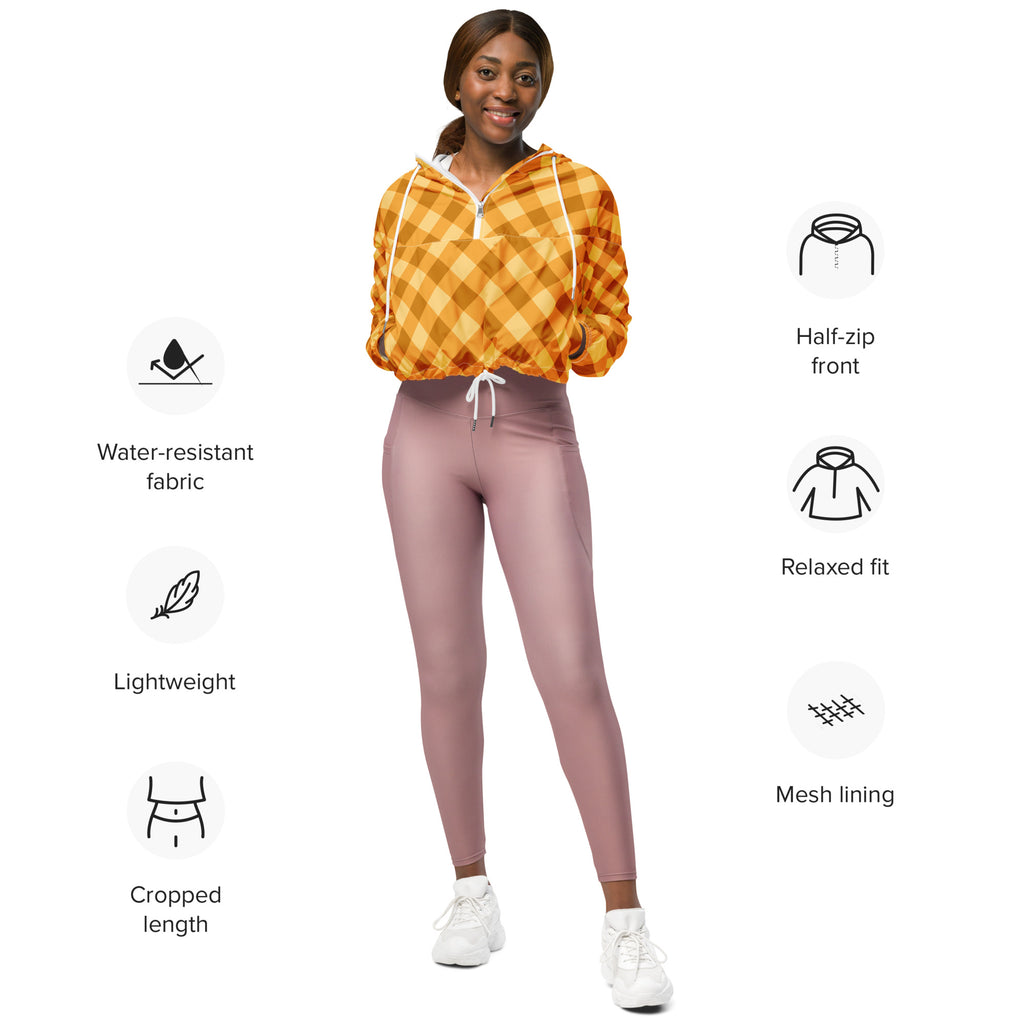 Women’s orange gingham cropped windbreaker with half-zip front made from lightweight water resistant fabric
