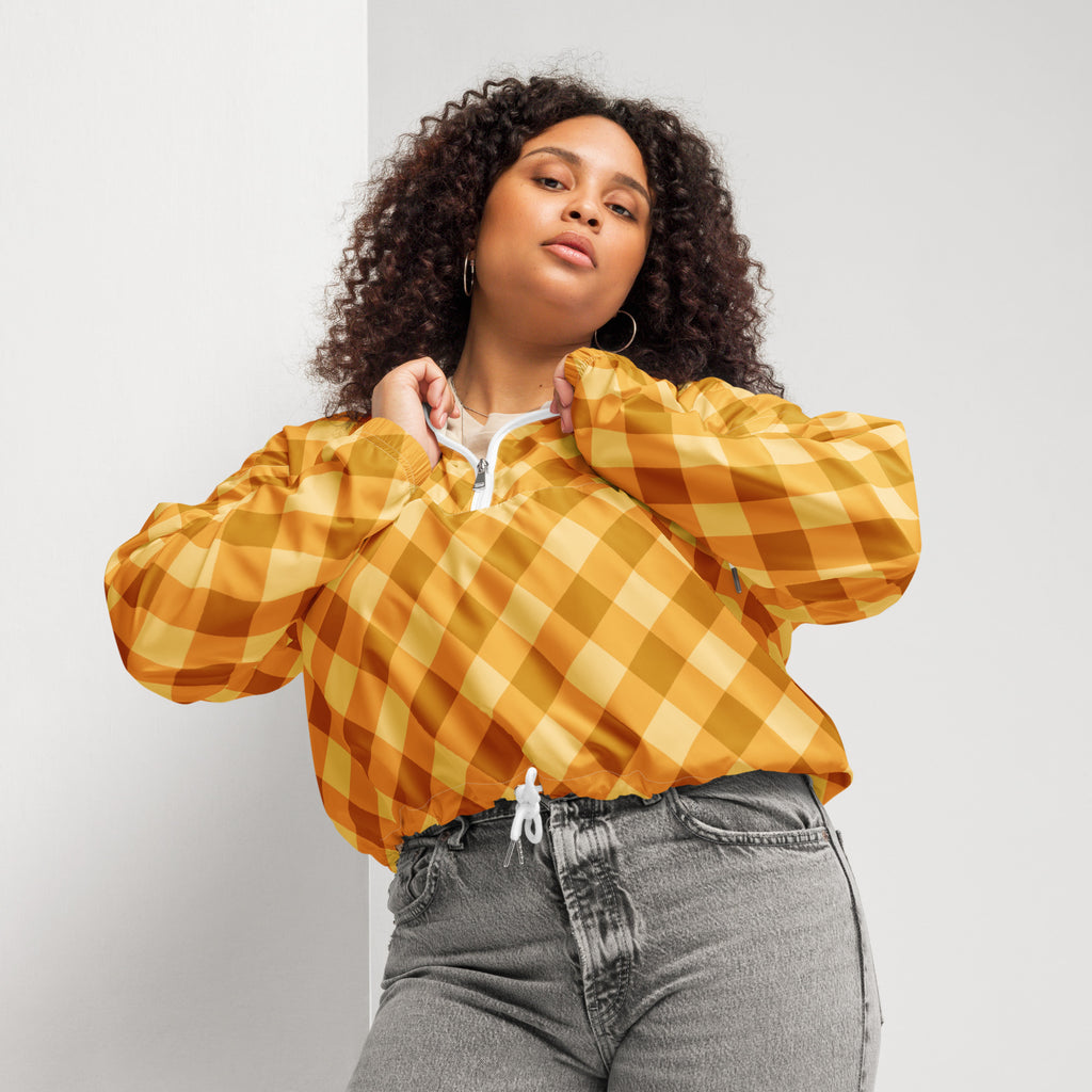 Women’s orange gingham cropped windbreaker with vibrant yellow and orange checkered design and white zipper pull