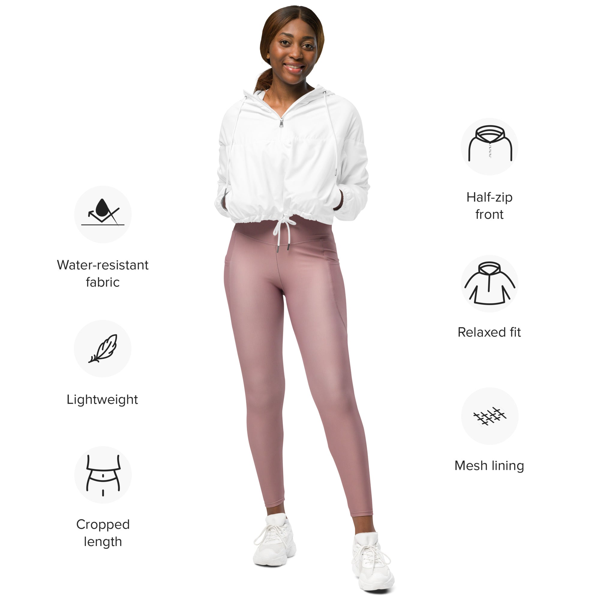 A pair of mauve water-resistant leggings with mesh lining and cropped length for active wear