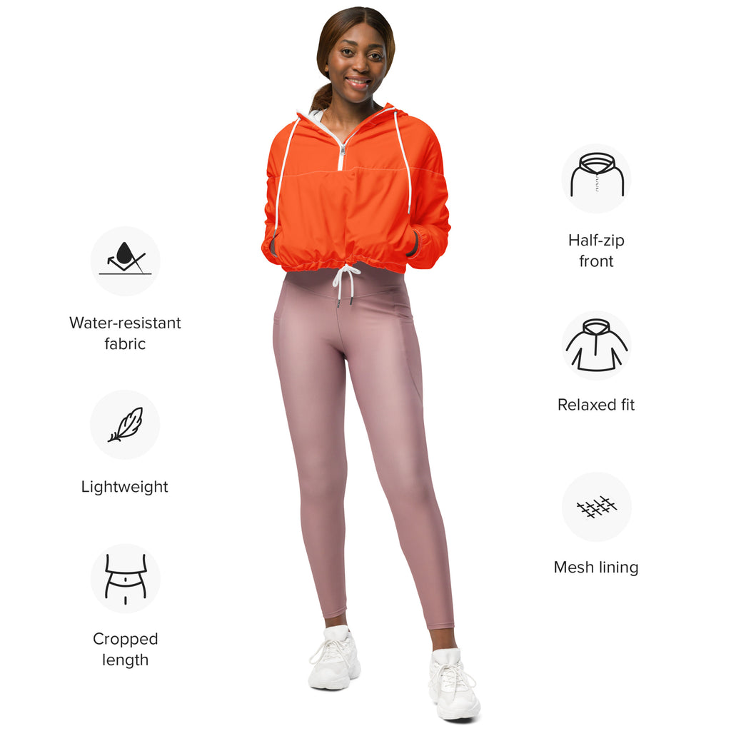 Women’s bright orange cropped windbreaker with white drawstrings half-zip front lightweight water resistant jacket
