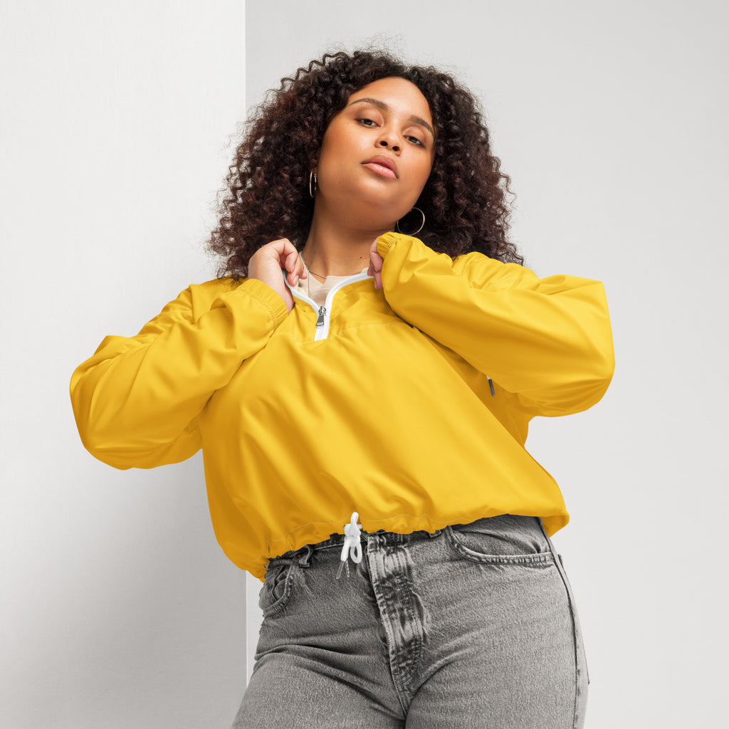 Women’s yellow cropped lightweight nylon bomber jacket with white zipper and adjustable drawstring waist