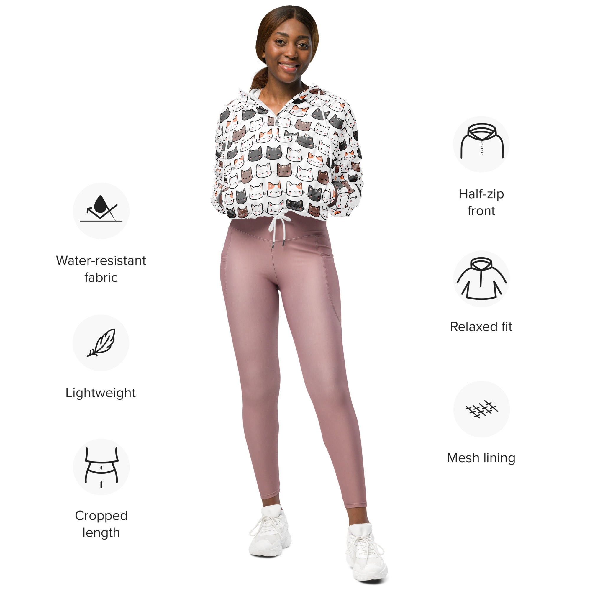 Women’s white cropped hoodie with playful multicolored cat faces, half-zip front, and breathable mesh lining