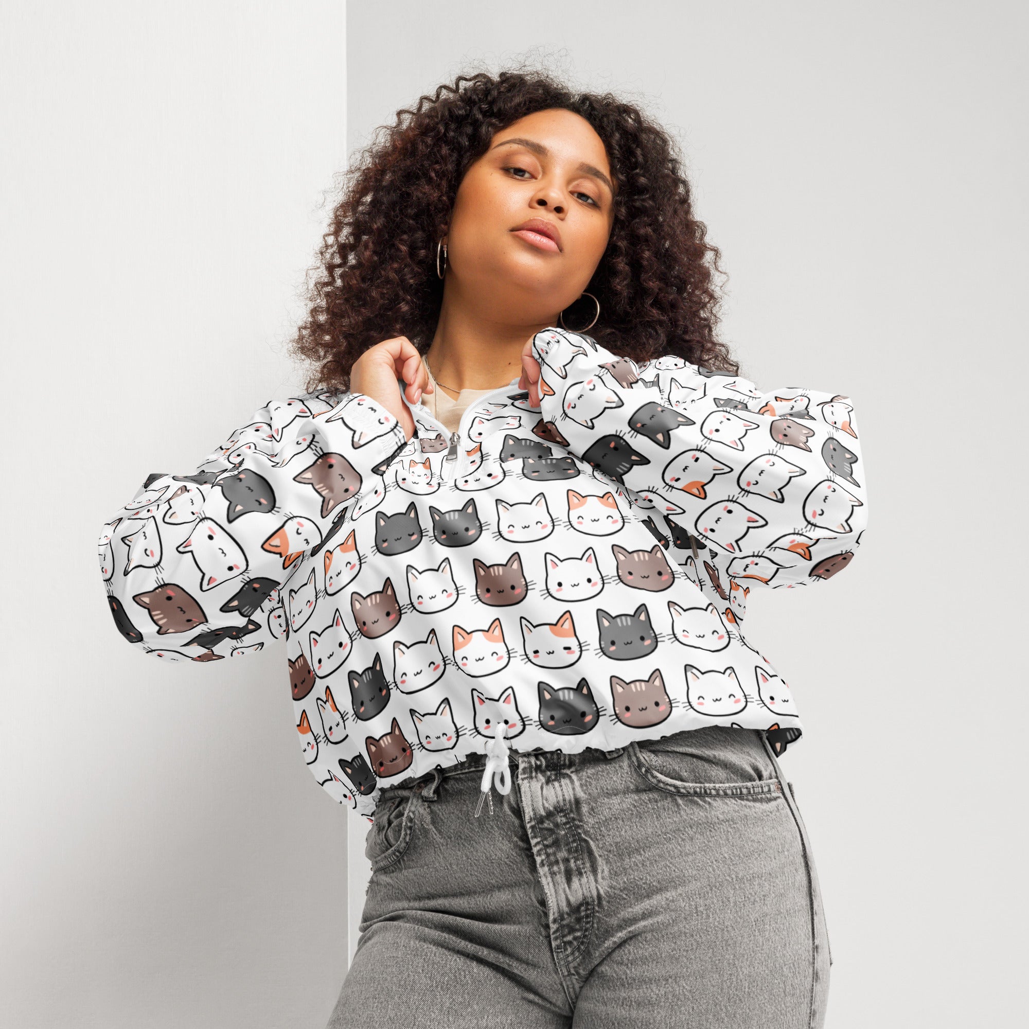 White cropped windbreaker jacket for women with adjustable hood and playful multicolor cartoon cat pattern