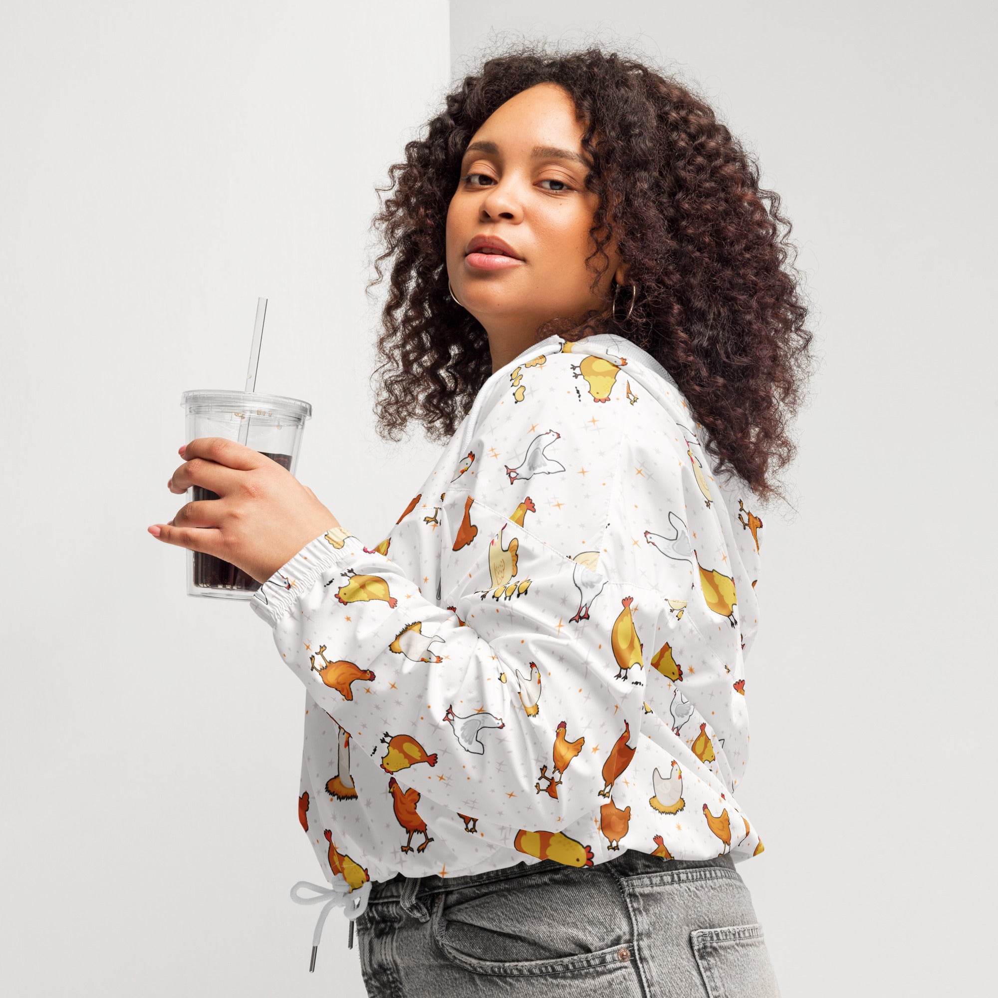 White long-sleeved cropped hoodie with playful orange brown and white chicken print lightweight and water resistant