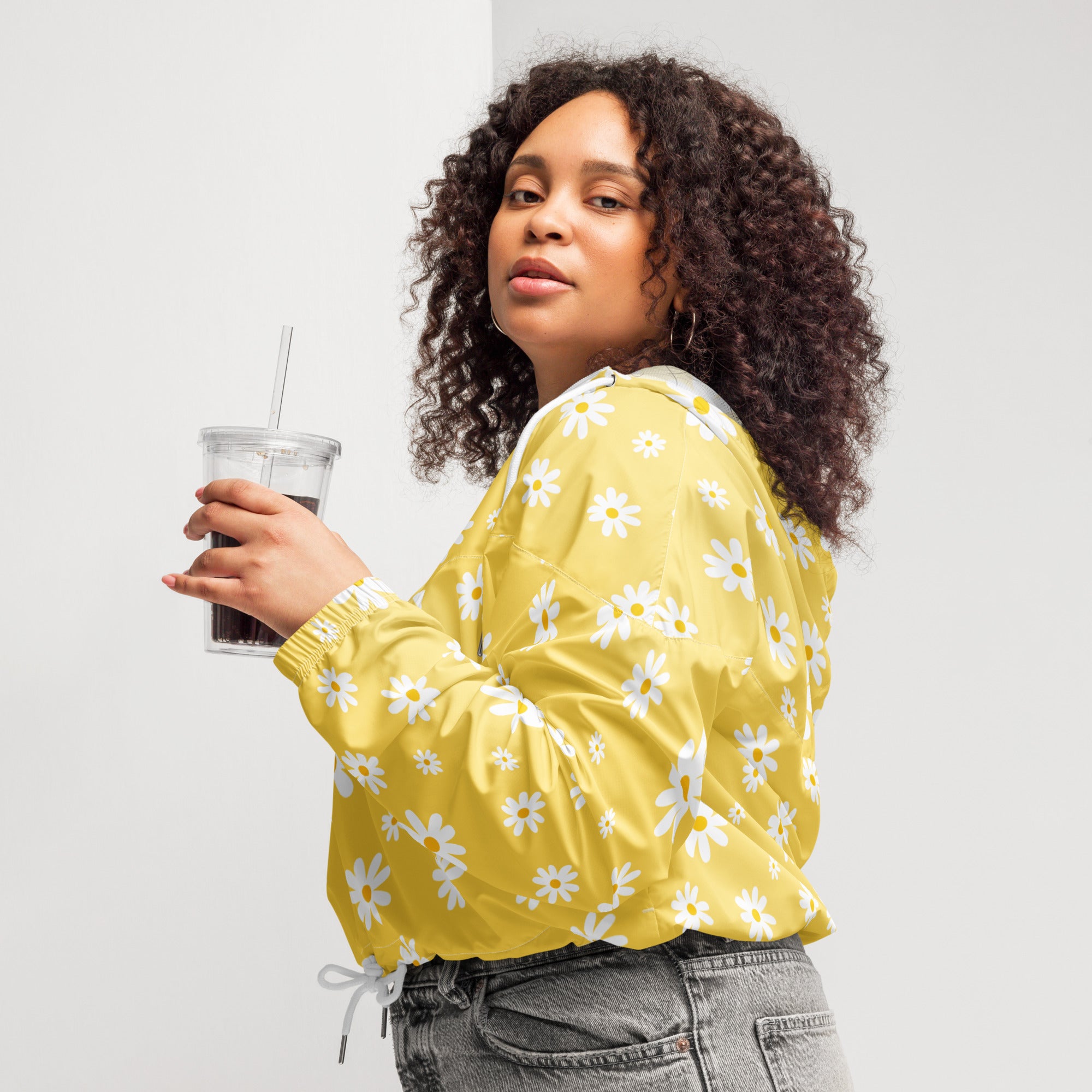 Yellow cropped windbreaker jacket with white daisy pattern lightweight water resistant with adjustable hood and pockets