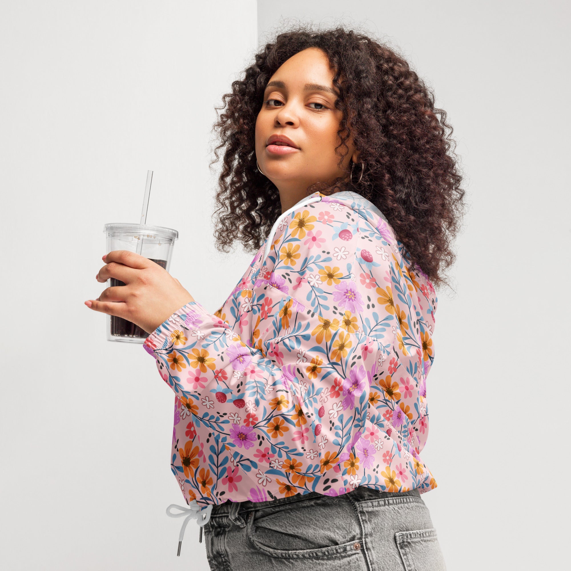 Women’s pink floral cropped windbreaker jacket with elastic cuffs drawstring waistband and adjustable hood