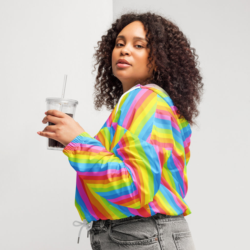Women’s rainbow stripe cropped windbreaker in vibrant shiny lightweight fabric with elastic cuffs and adjustable hood