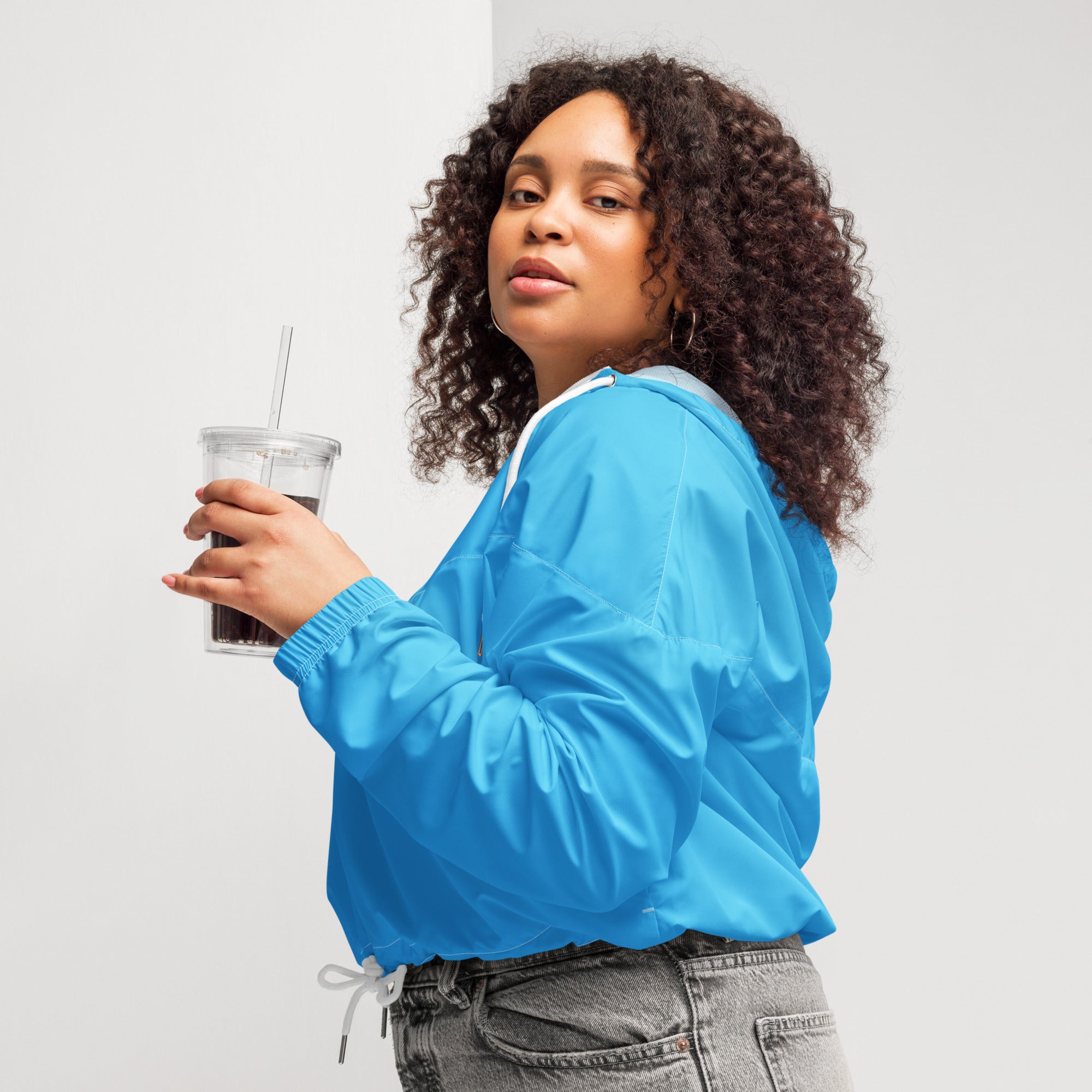 Women’s sky blue cropped satin bomber jacket with white drawstring waist and hood lining lightweight and water resistant